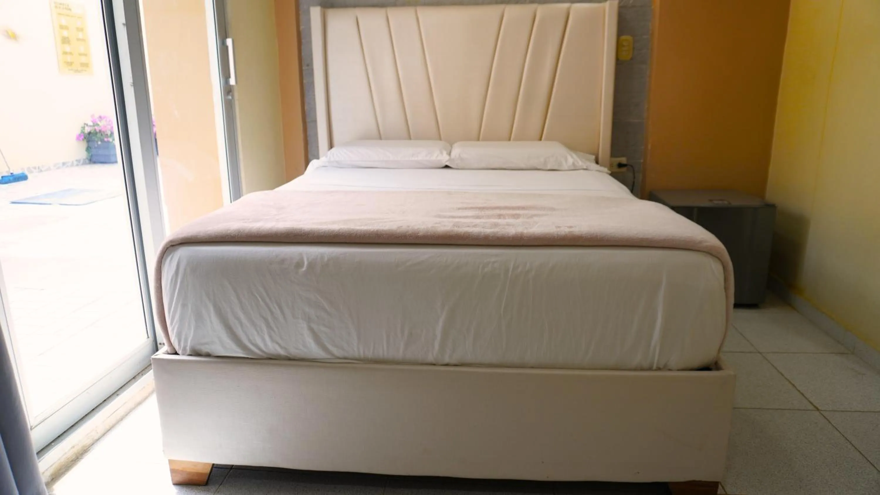 Bed in Hotel y Cabañas Covemar