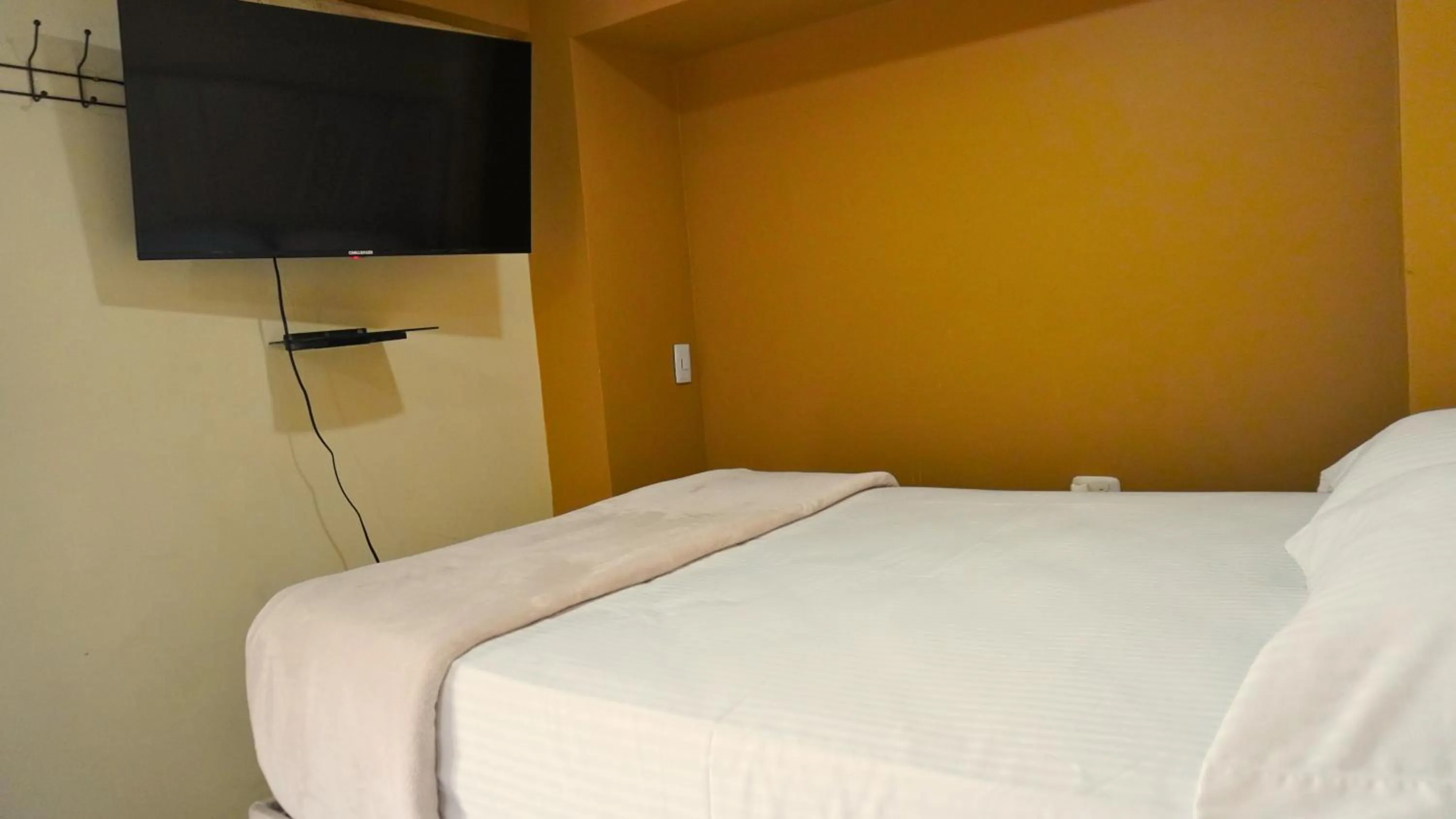 Bed in Hotel y Cabañas Covemar