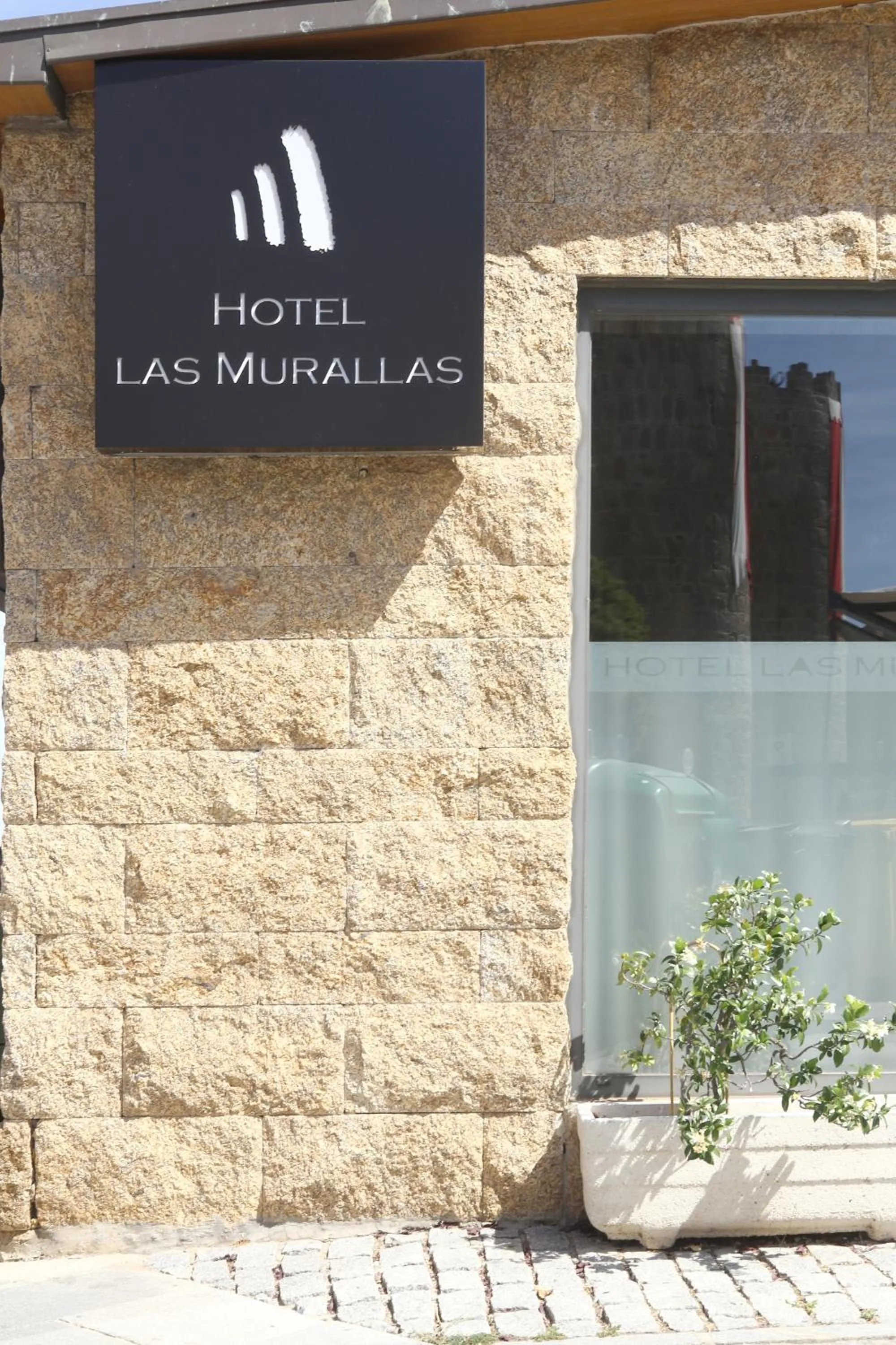 Property logo or sign in Hotel Las Murallas