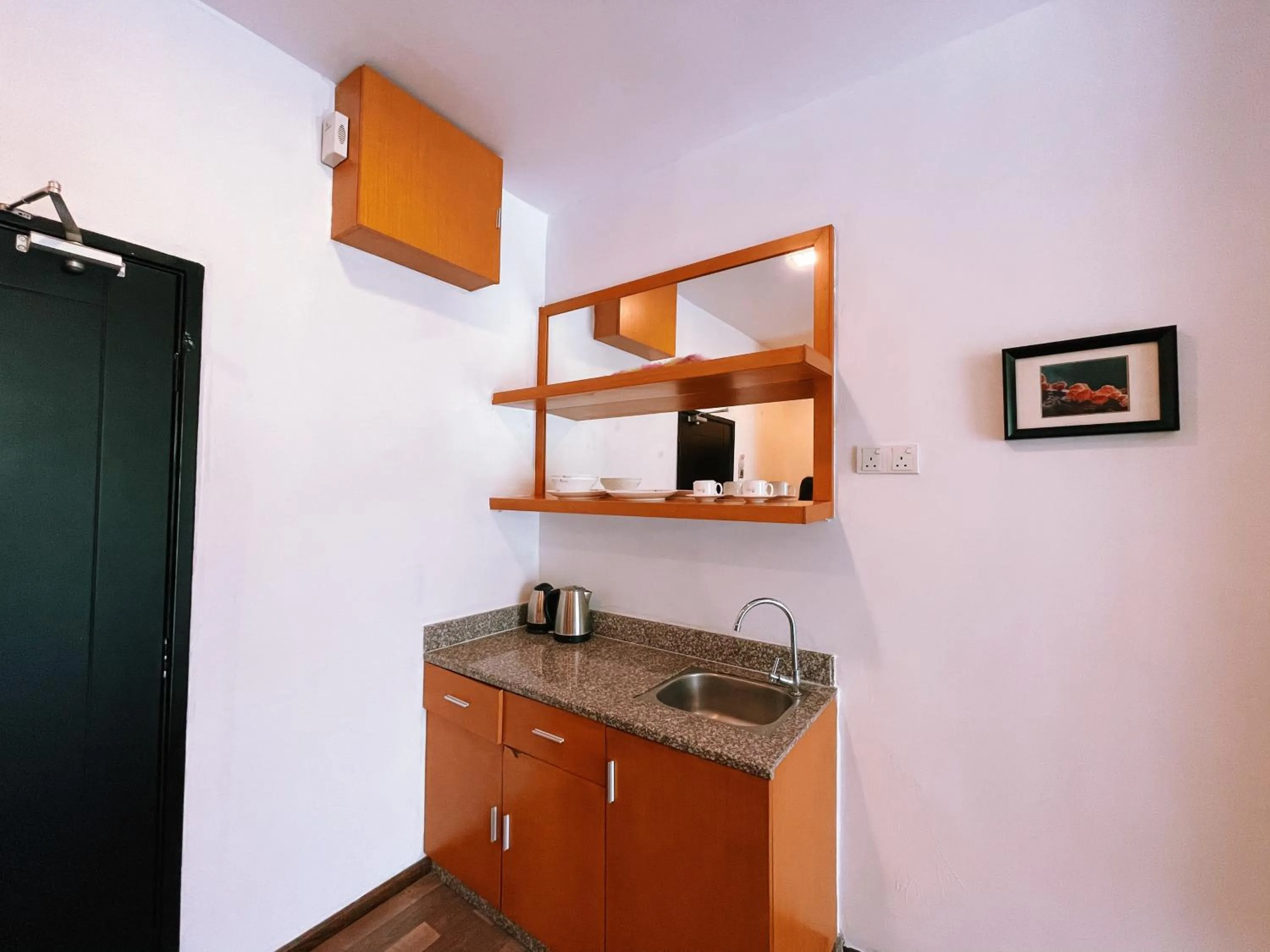 Kitchen or kitchenette in NOVA Apartment at Cameron