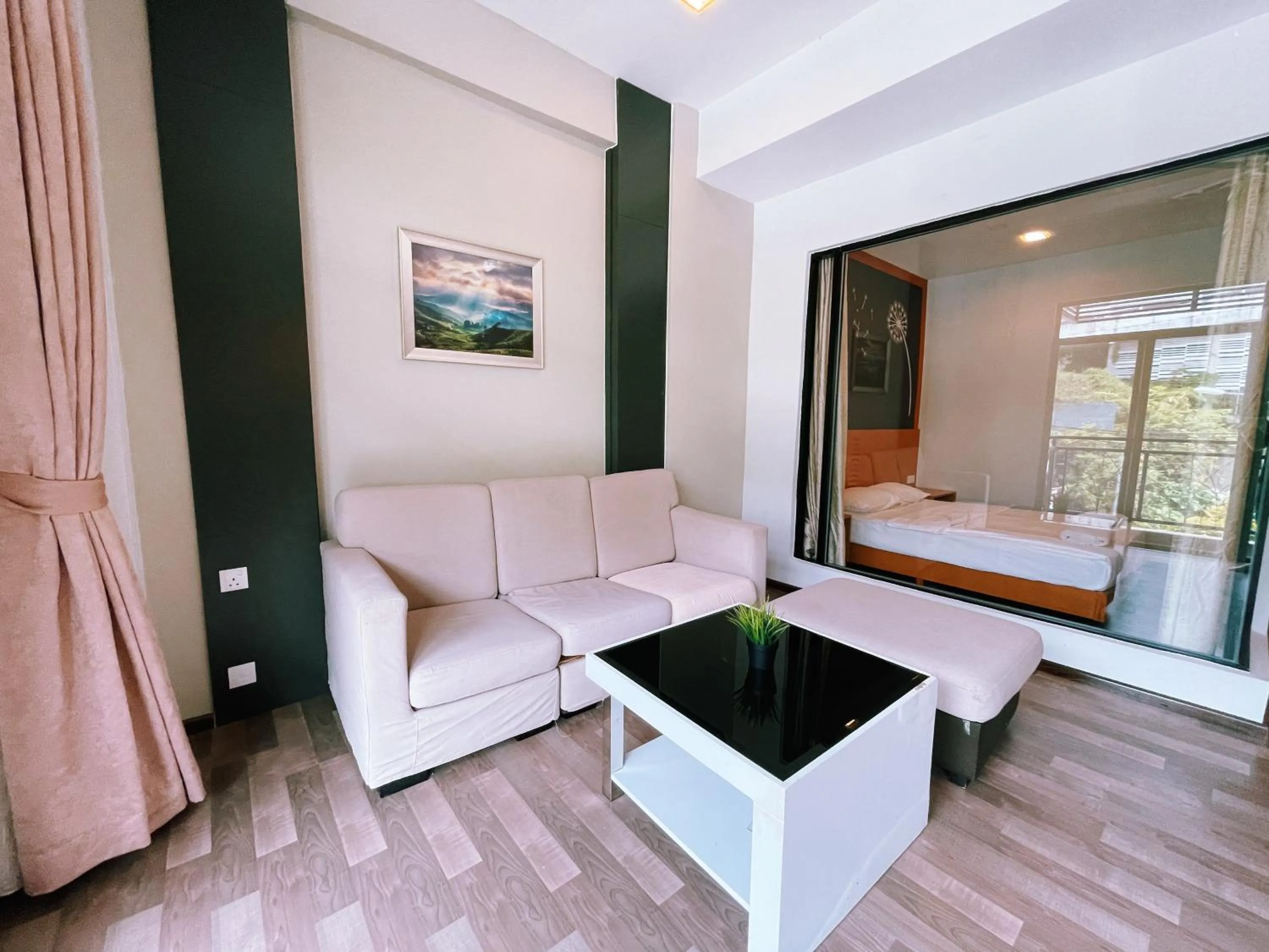 Living room, Bed in NOVA Apartment at Cameron