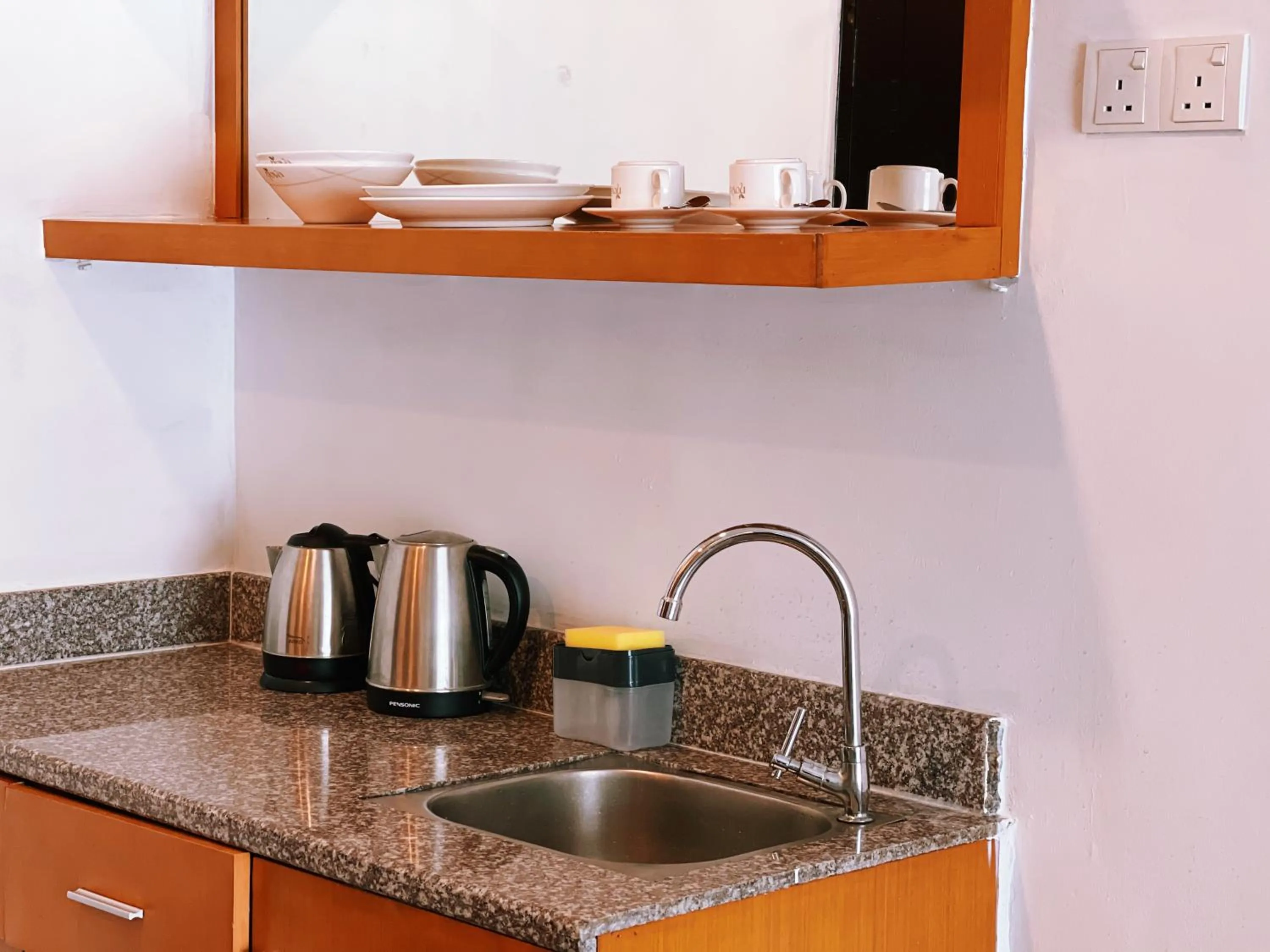 Kitchen or kitchenette in NOVA Apartment at Cameron