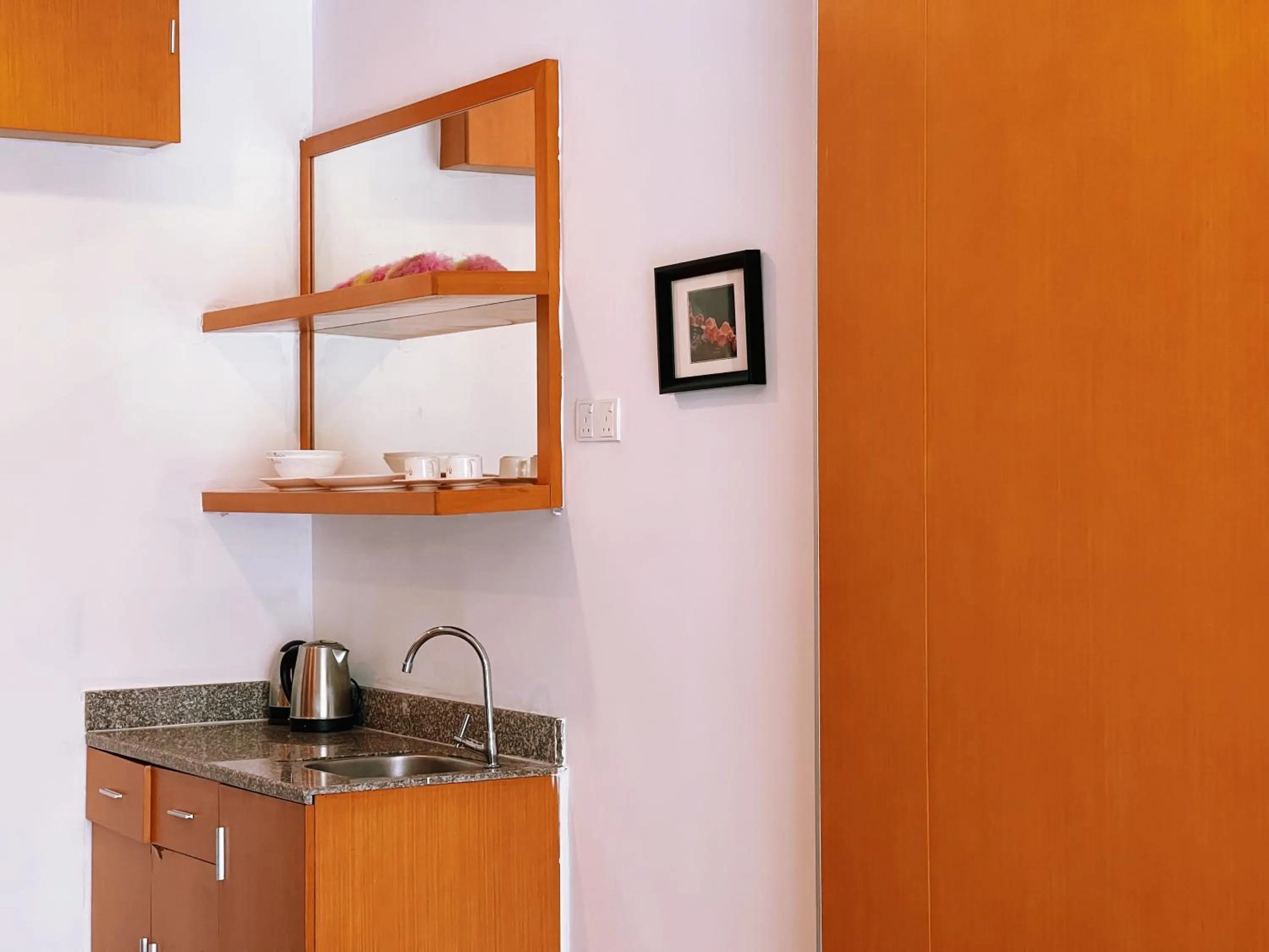 Kitchen or kitchenette in NOVA Apartment at Cameron
