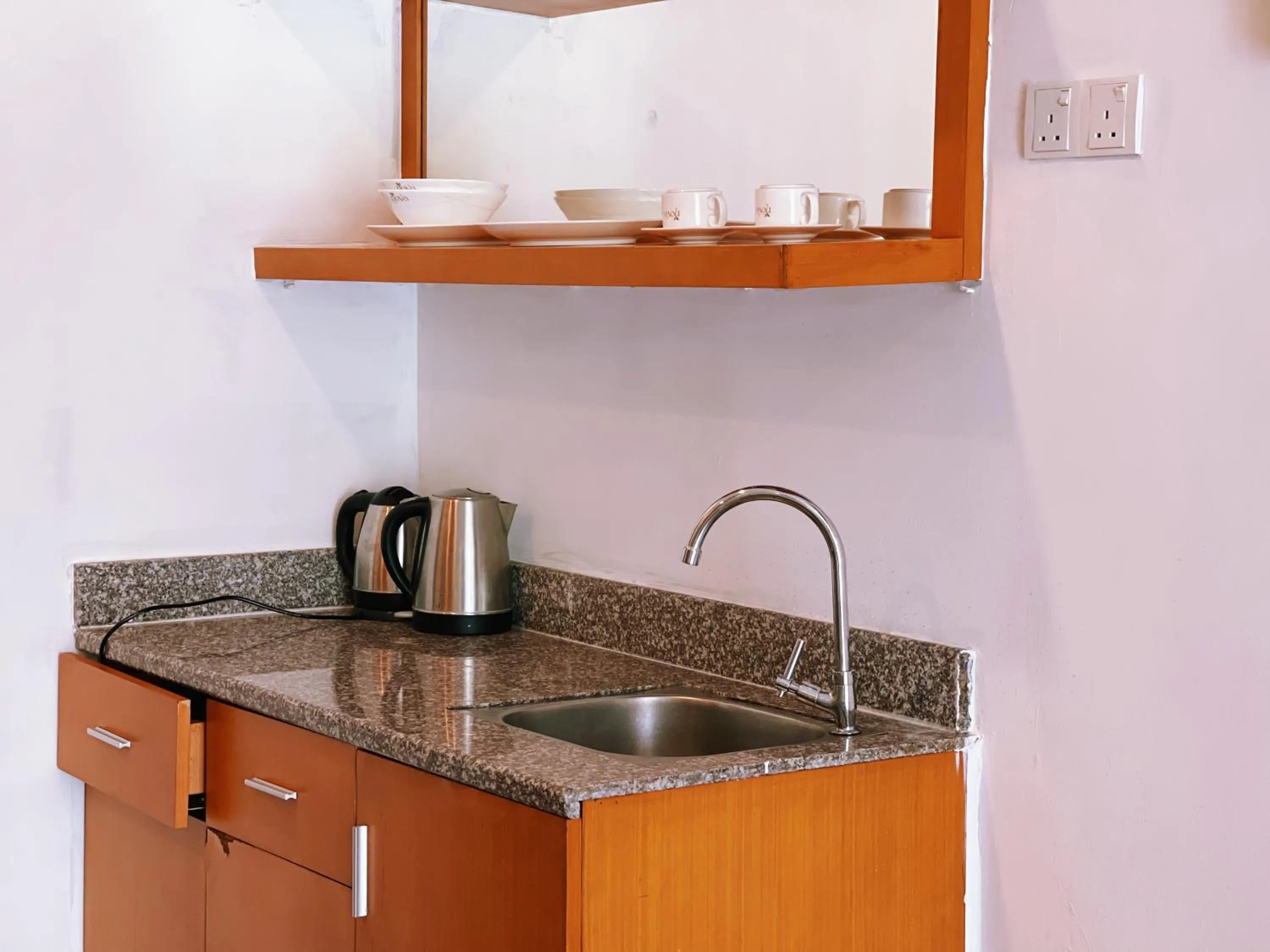 Kitchen or kitchenette in NOVA Apartment at Cameron