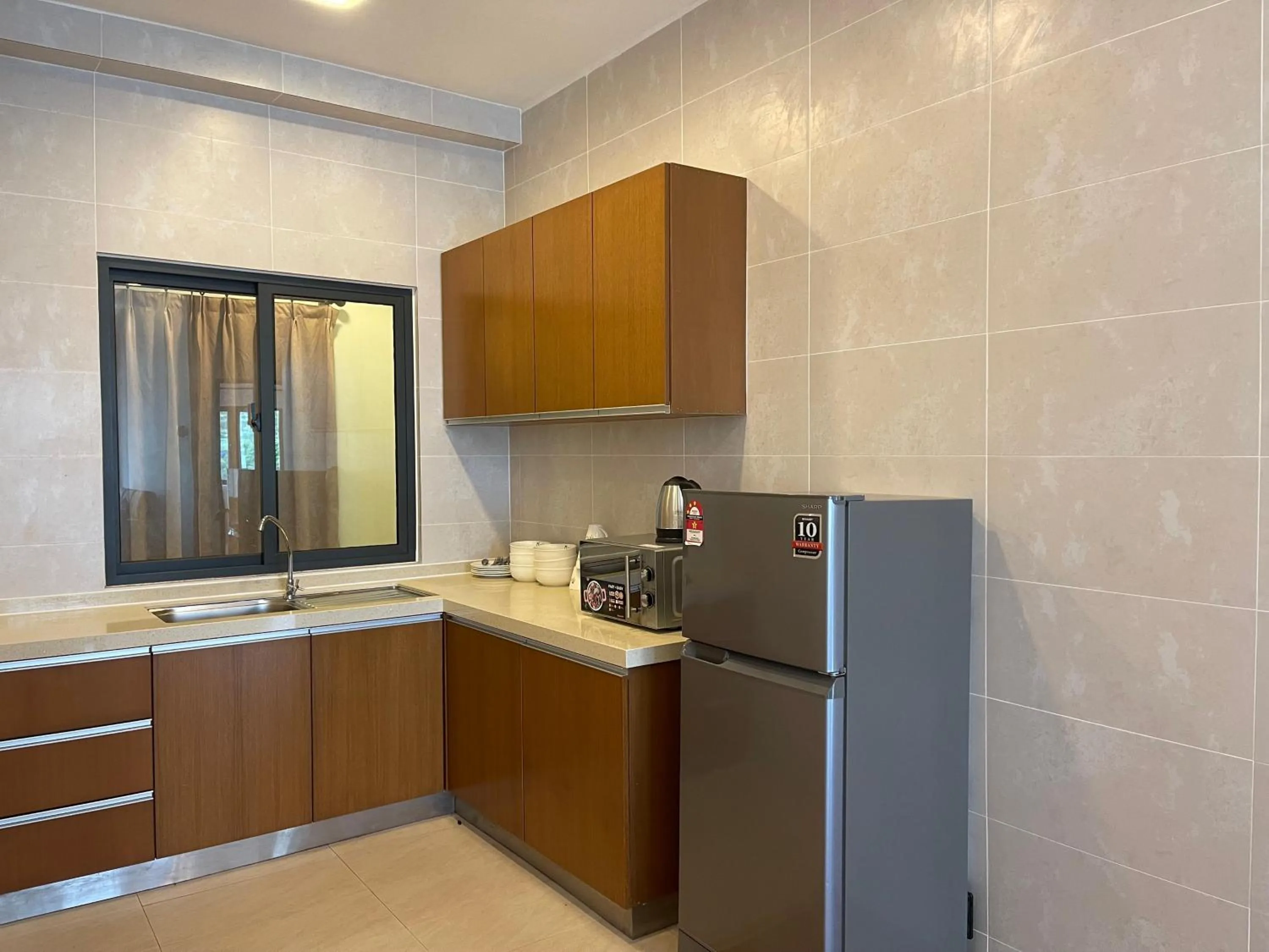 Kitchen or kitchenette in NOVA Apartment at Cameron