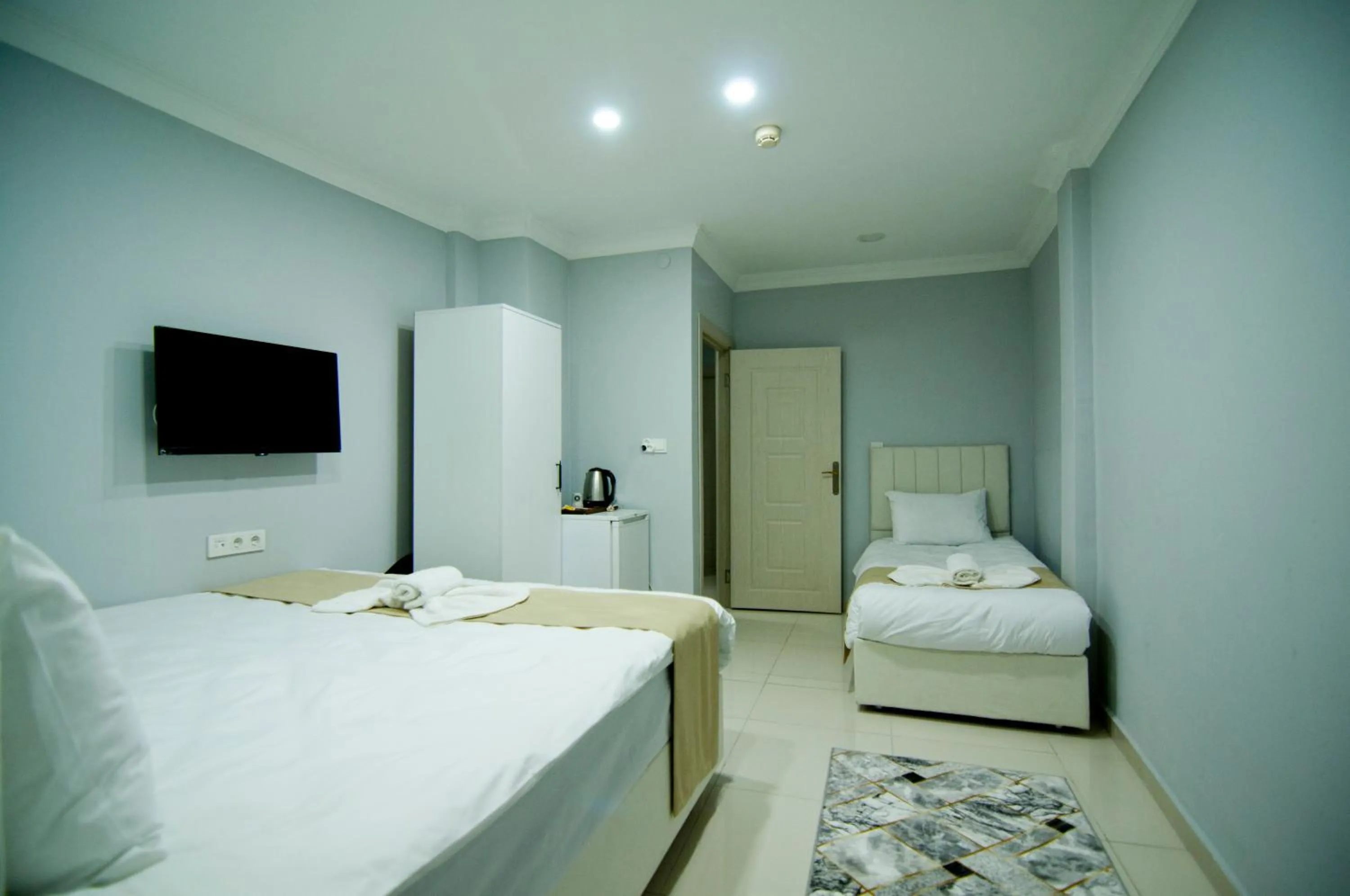 Bed in İstanbul Palace Hotel