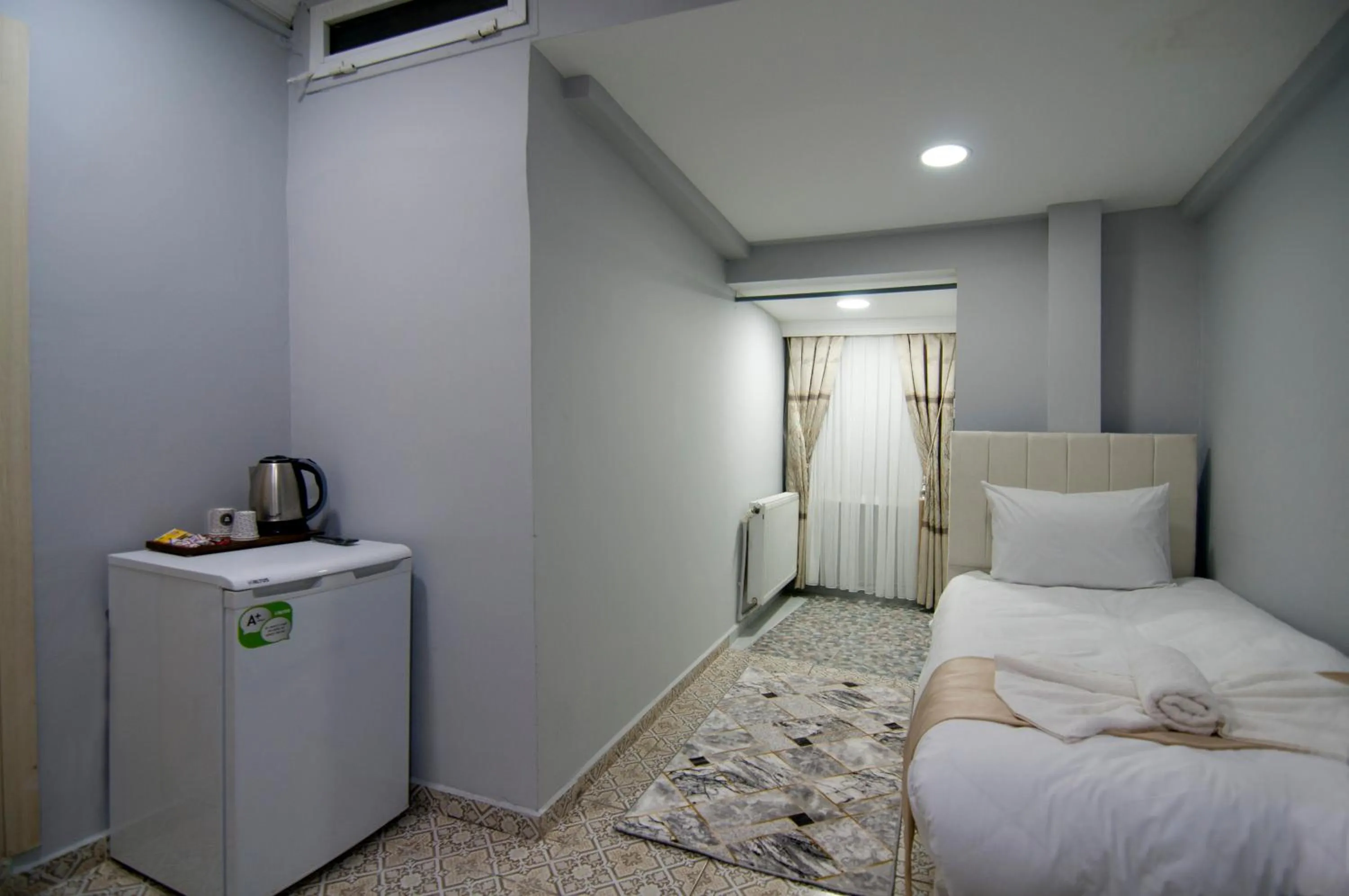 Bed in İstanbul Palace Hotel