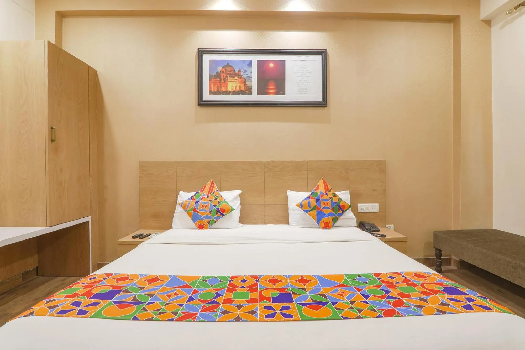 Bed in FabHotel Raghubar Kripa