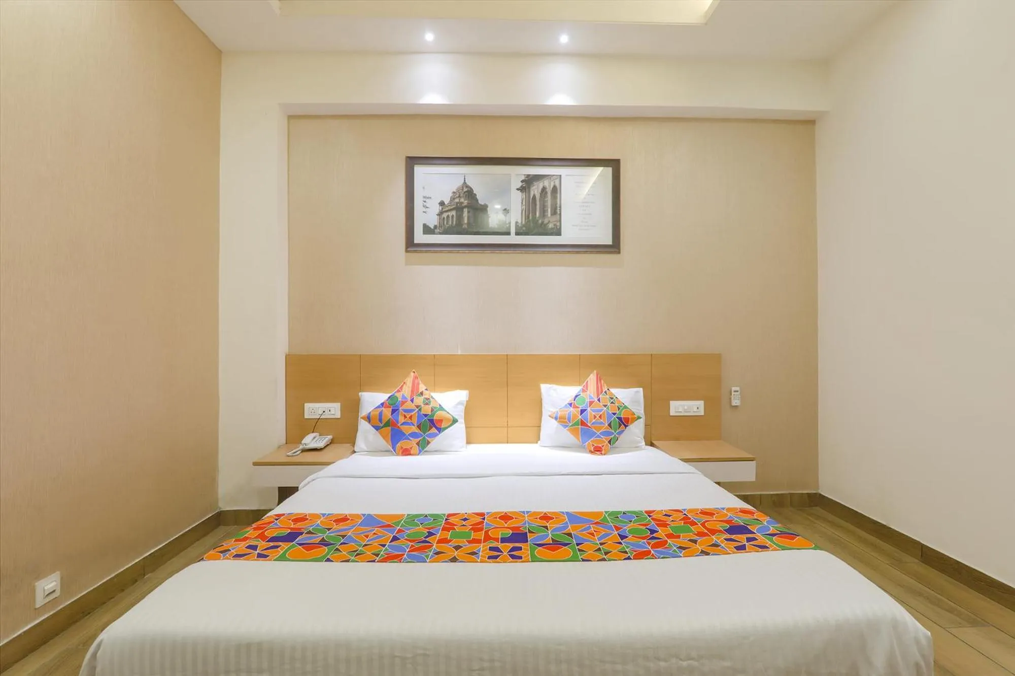 Bed in FabHotel Raghubar Kripa
