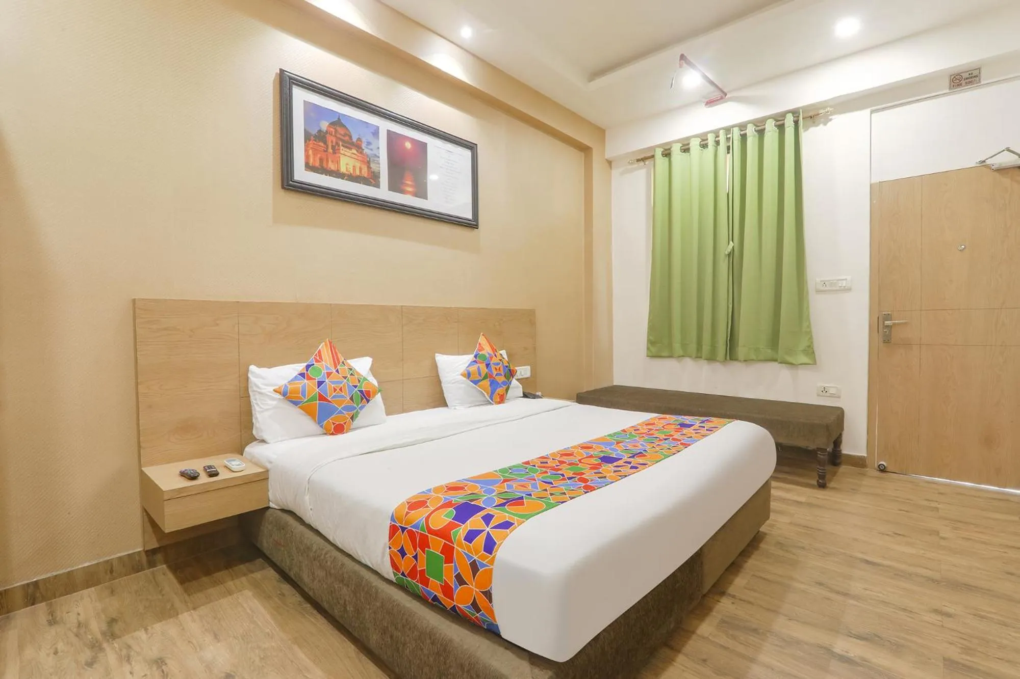 Bed in FabHotel Raghubar Kripa