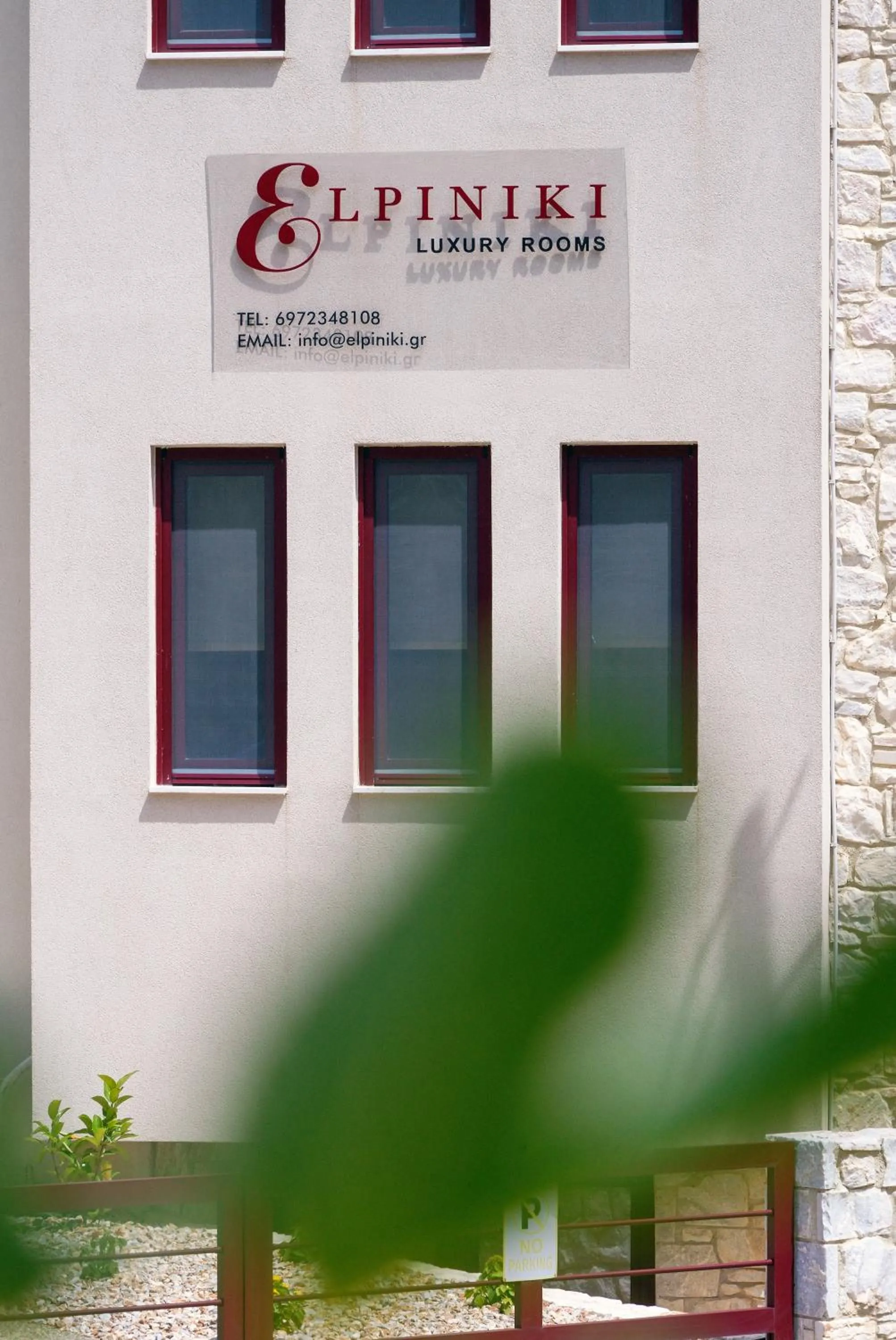 Property logo or sign in Elpiniki Luxury Rooms