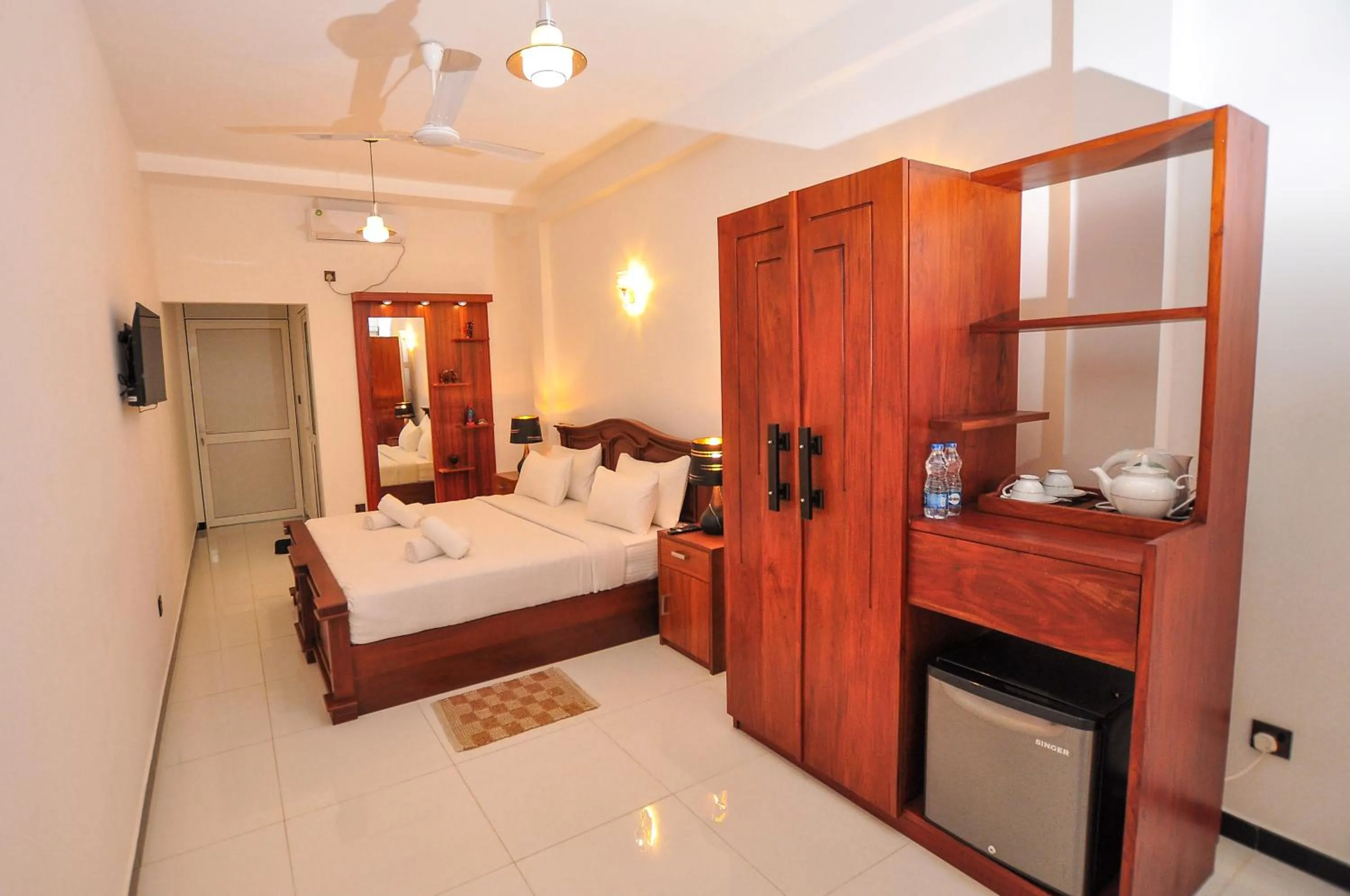 Bed in Sachinro Hotel Mirissa