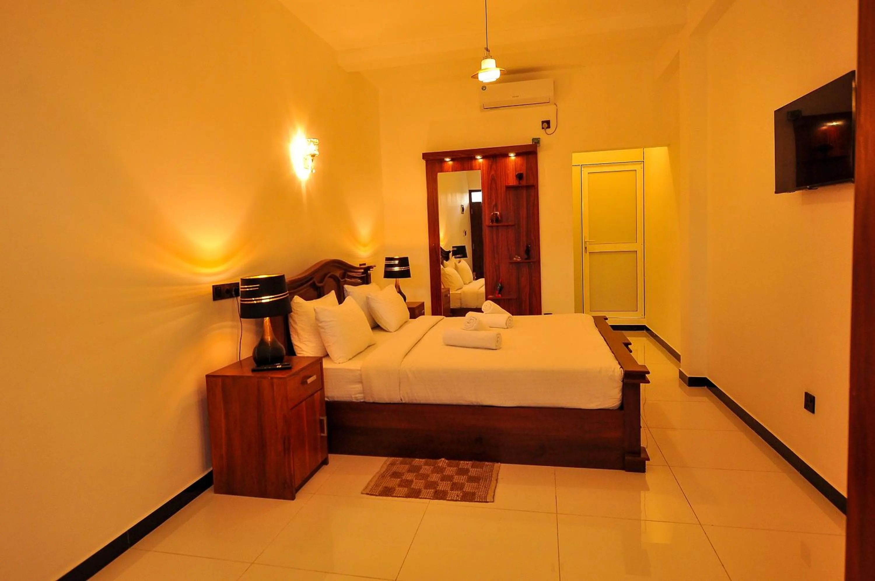 Bed in Sachinro Hotel Mirissa