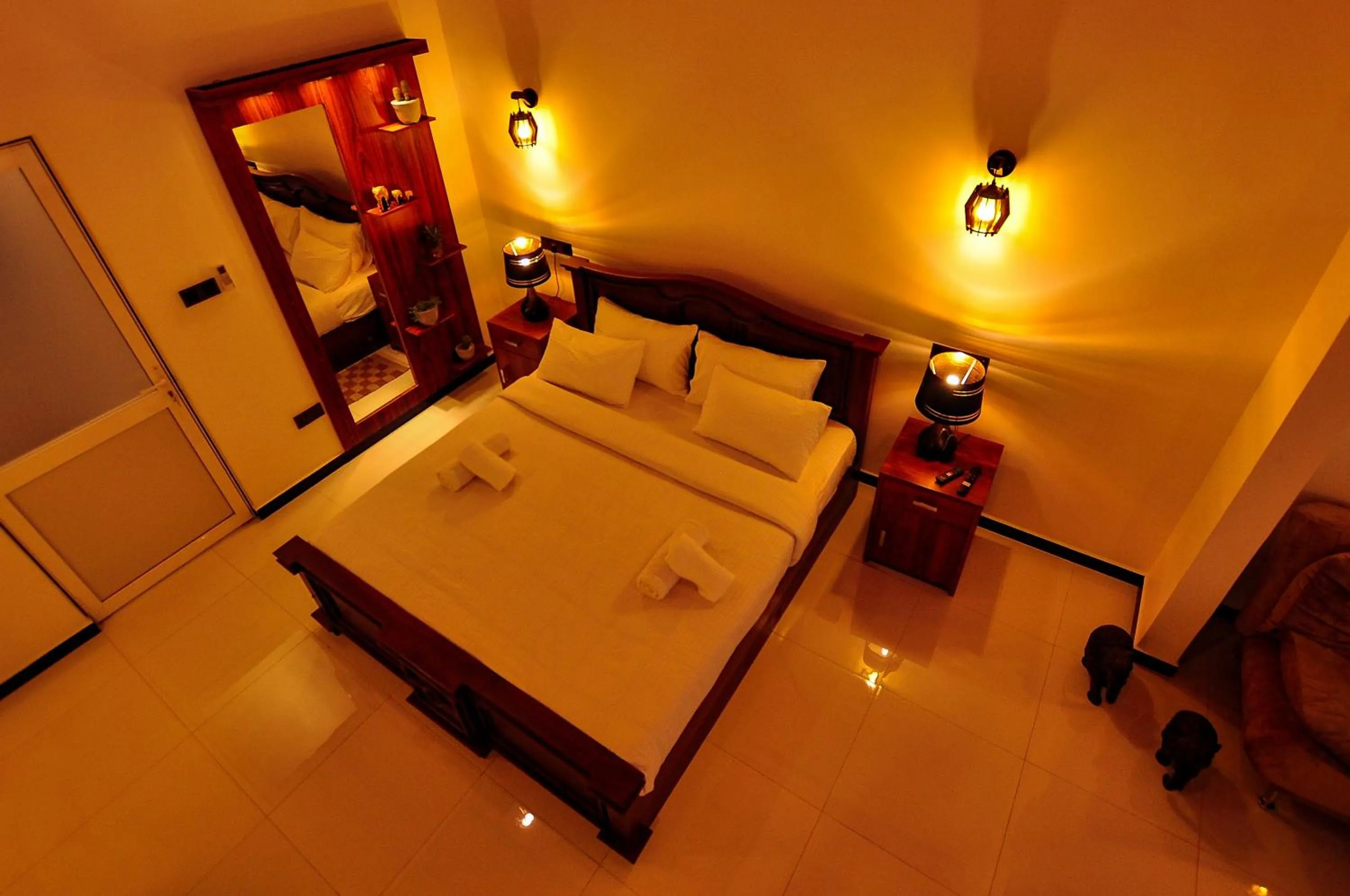 Bed in Sachinro Hotel Mirissa