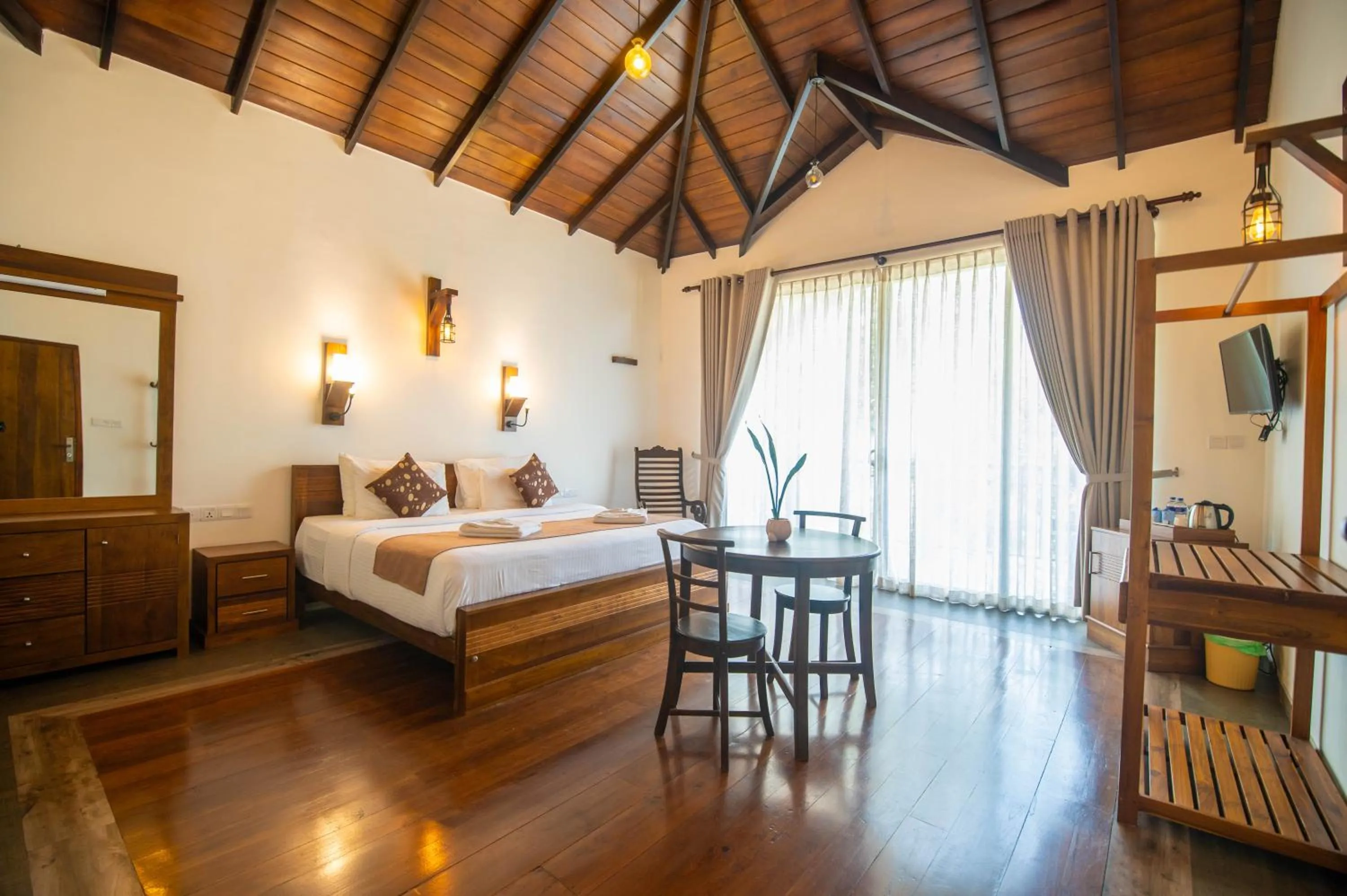 Bed in Grand Argyle Resort