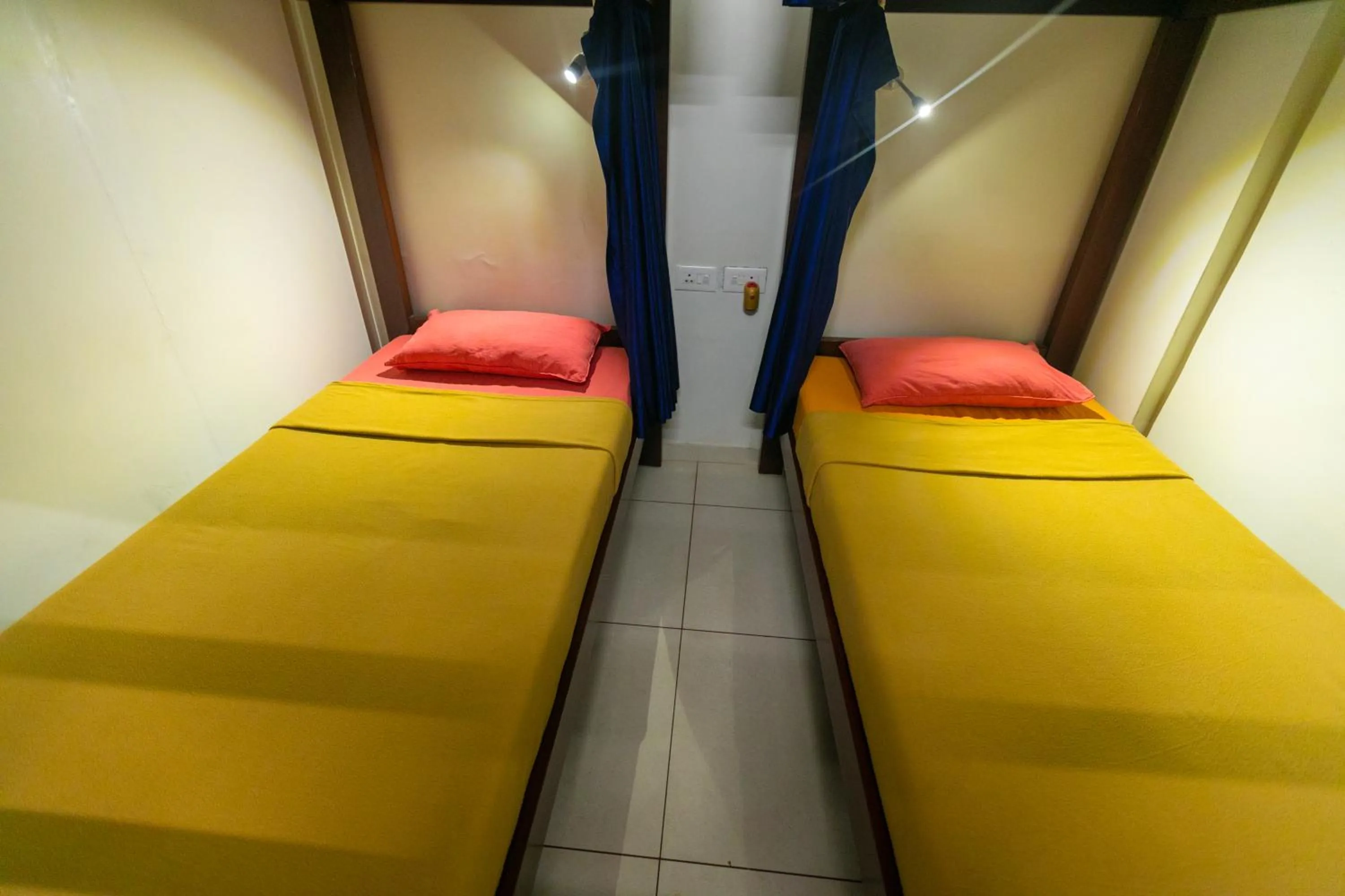 Bed in Bay Stays near white town