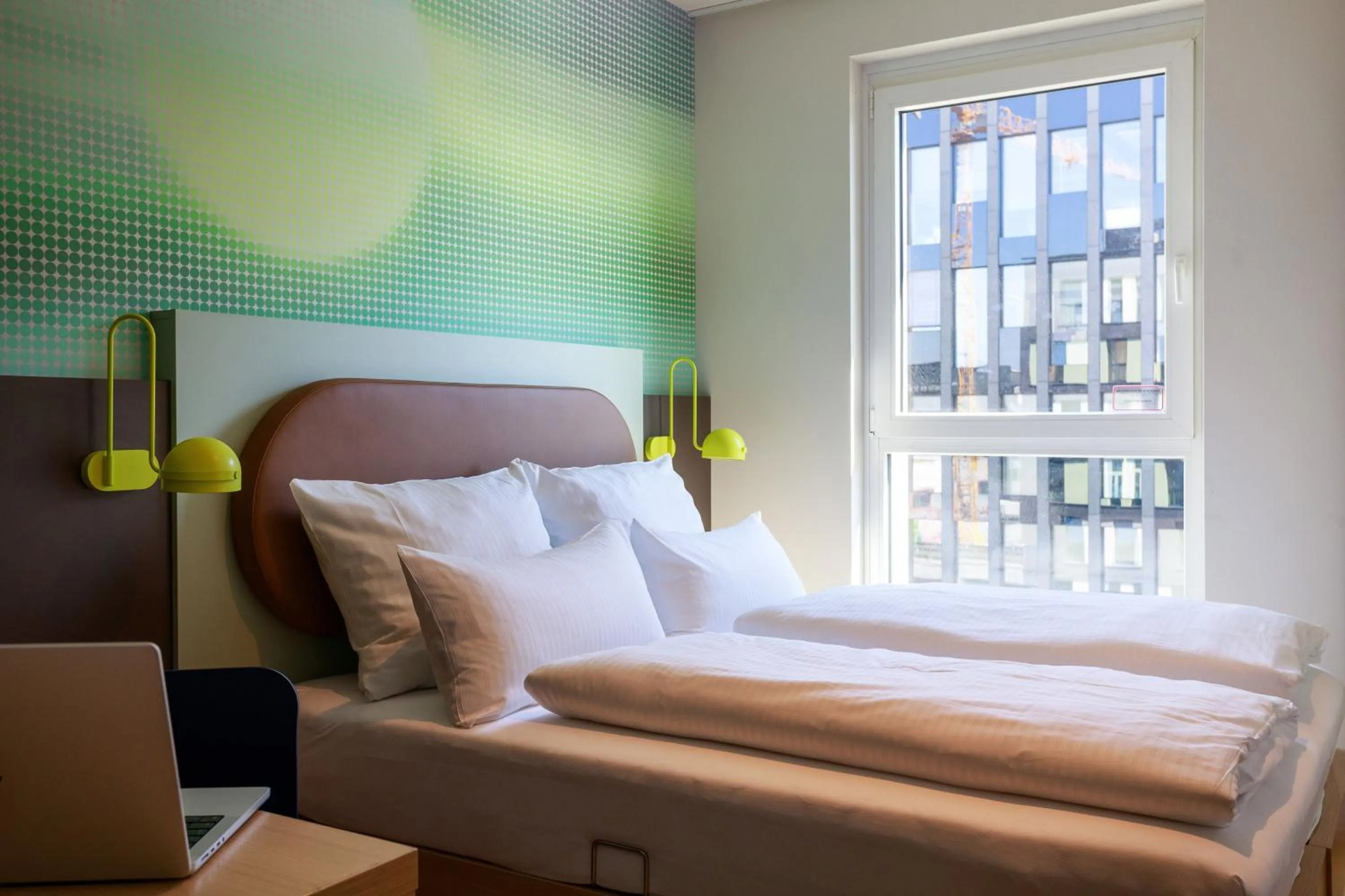 Photo of the whole room, Bed in LyvInn Hotel Frankfurt