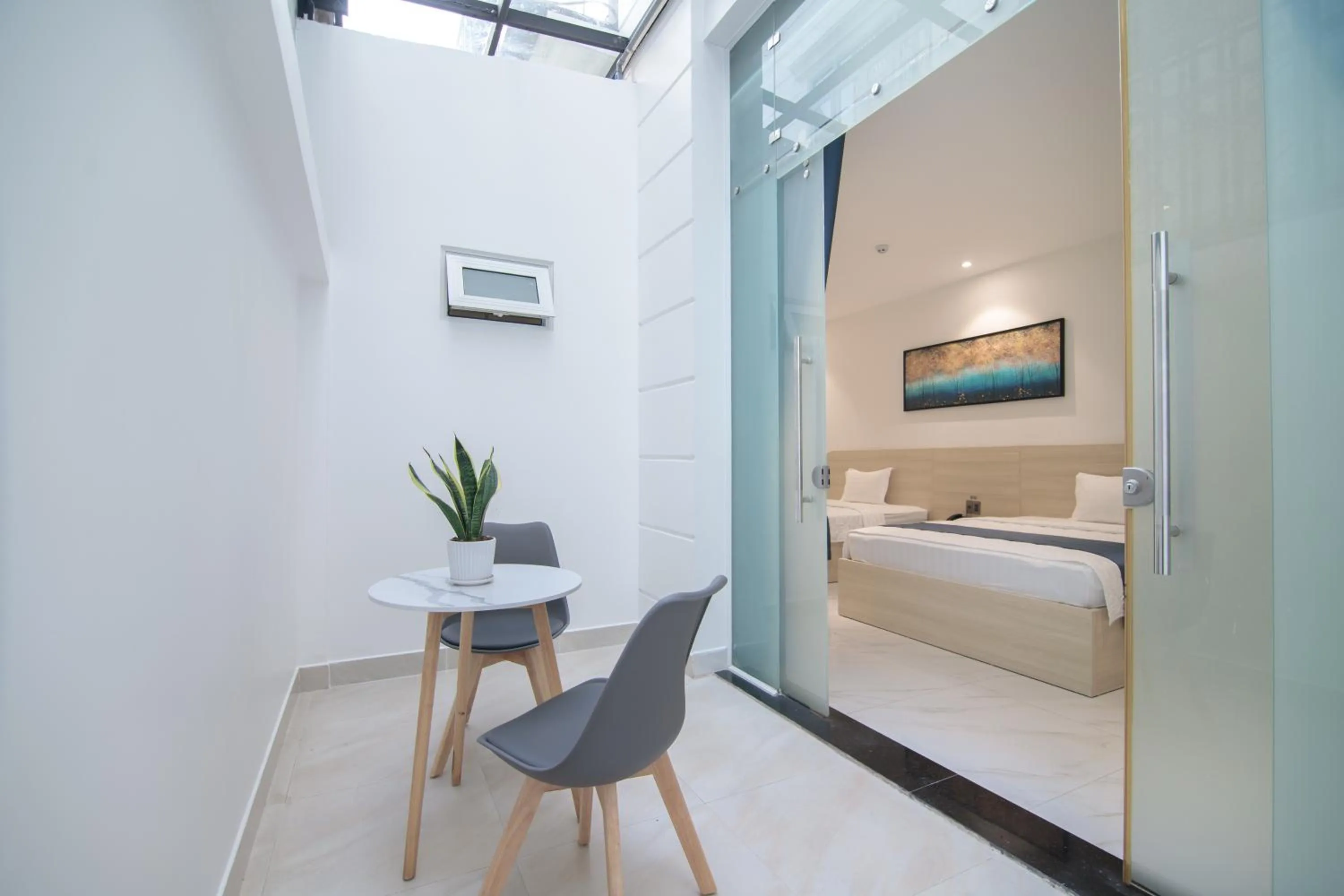 Seating area, Bed in Bin Bin Hotel 8 - Near Sunrise City