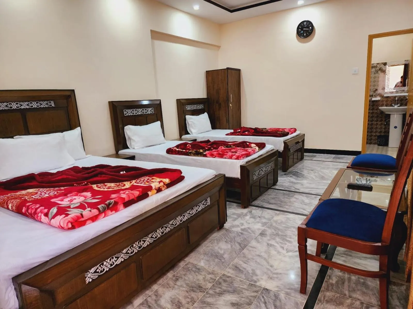 Bed in New Palace Guest House