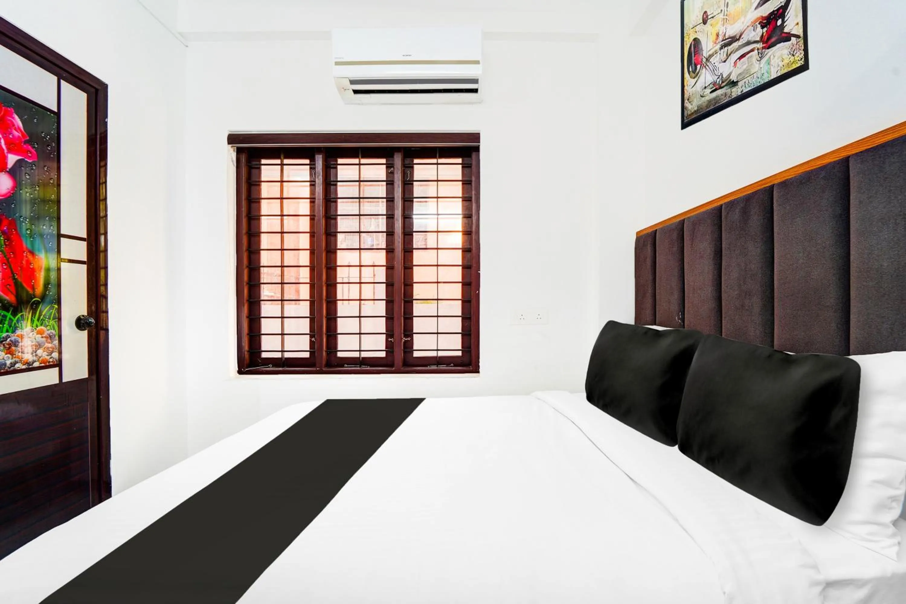 Bedroom, Bed in Hotel O Attukal Near Attakulangara Formerly Remya Residency