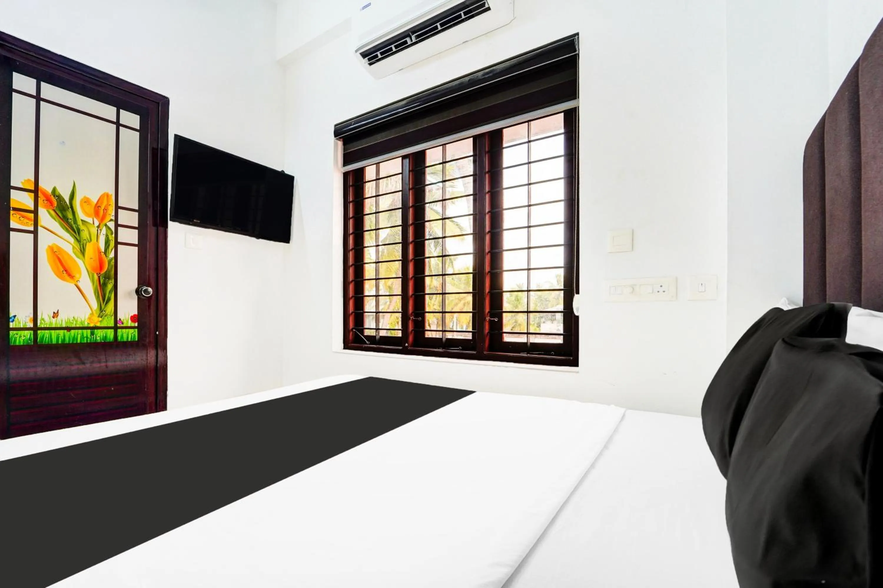 Bedroom, Bed in Hotel O Attukal Near Attakulangara Formerly Remya Residency