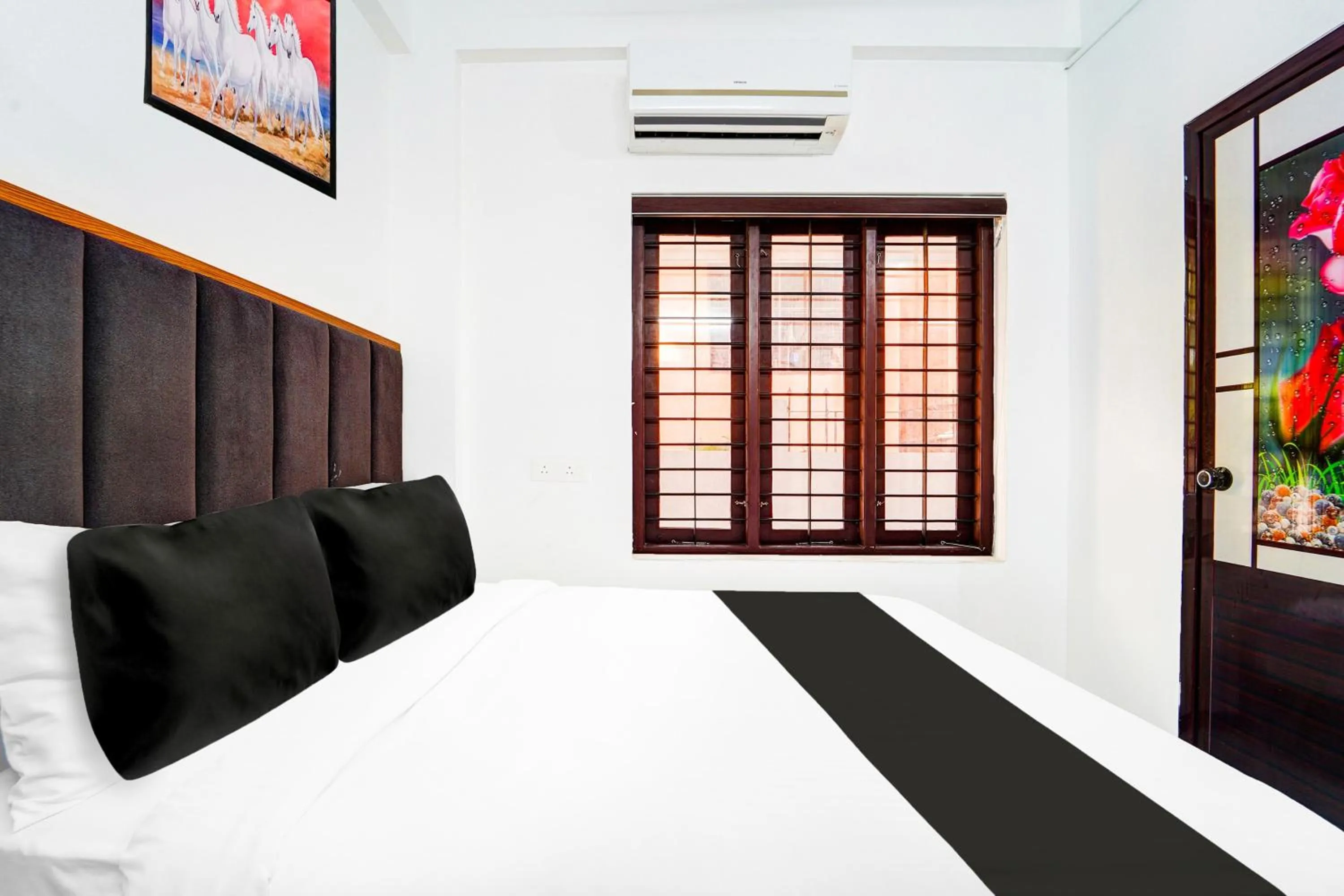 Bedroom, Bed in Hotel O Attukal Near Attakulangara Formerly Remya Residency