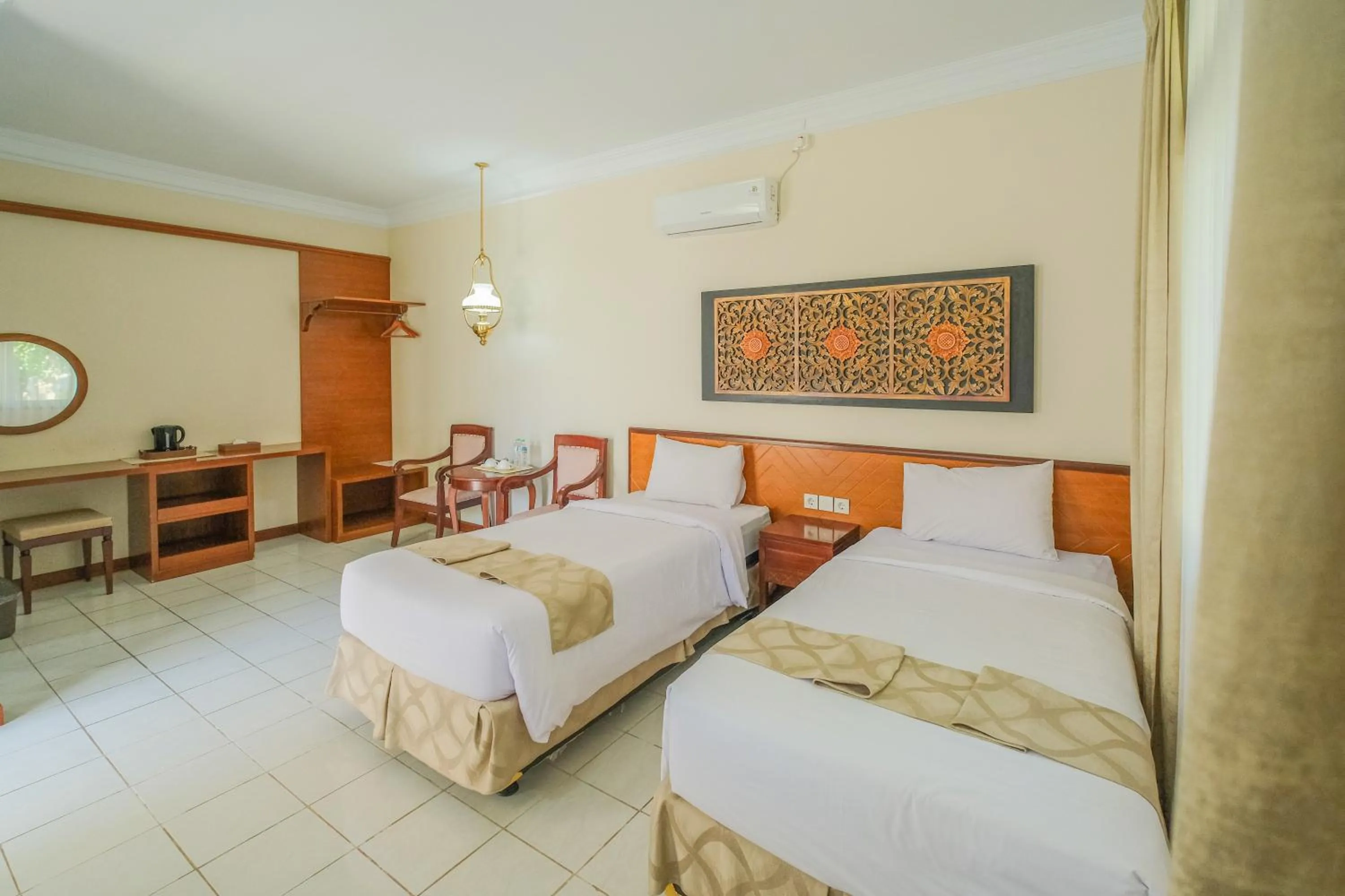 Bed in Royal Brongto Hotel