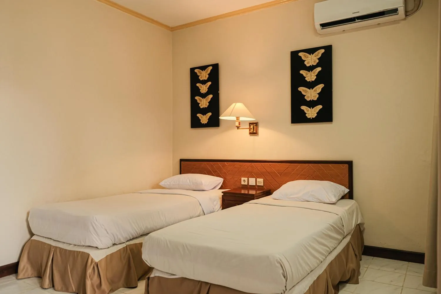 Bed in Royal Brongto Hotel