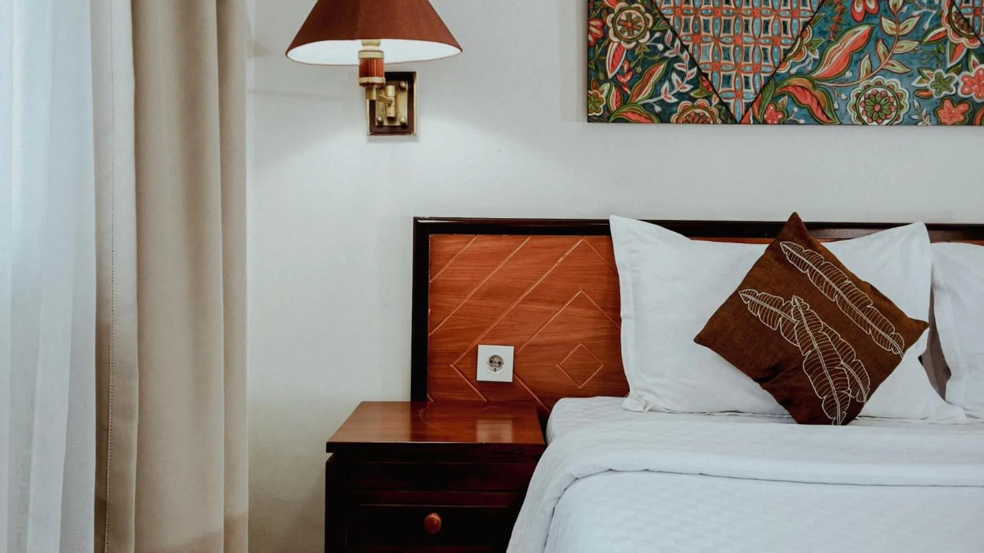 Bed in Royal Brongto Hotel