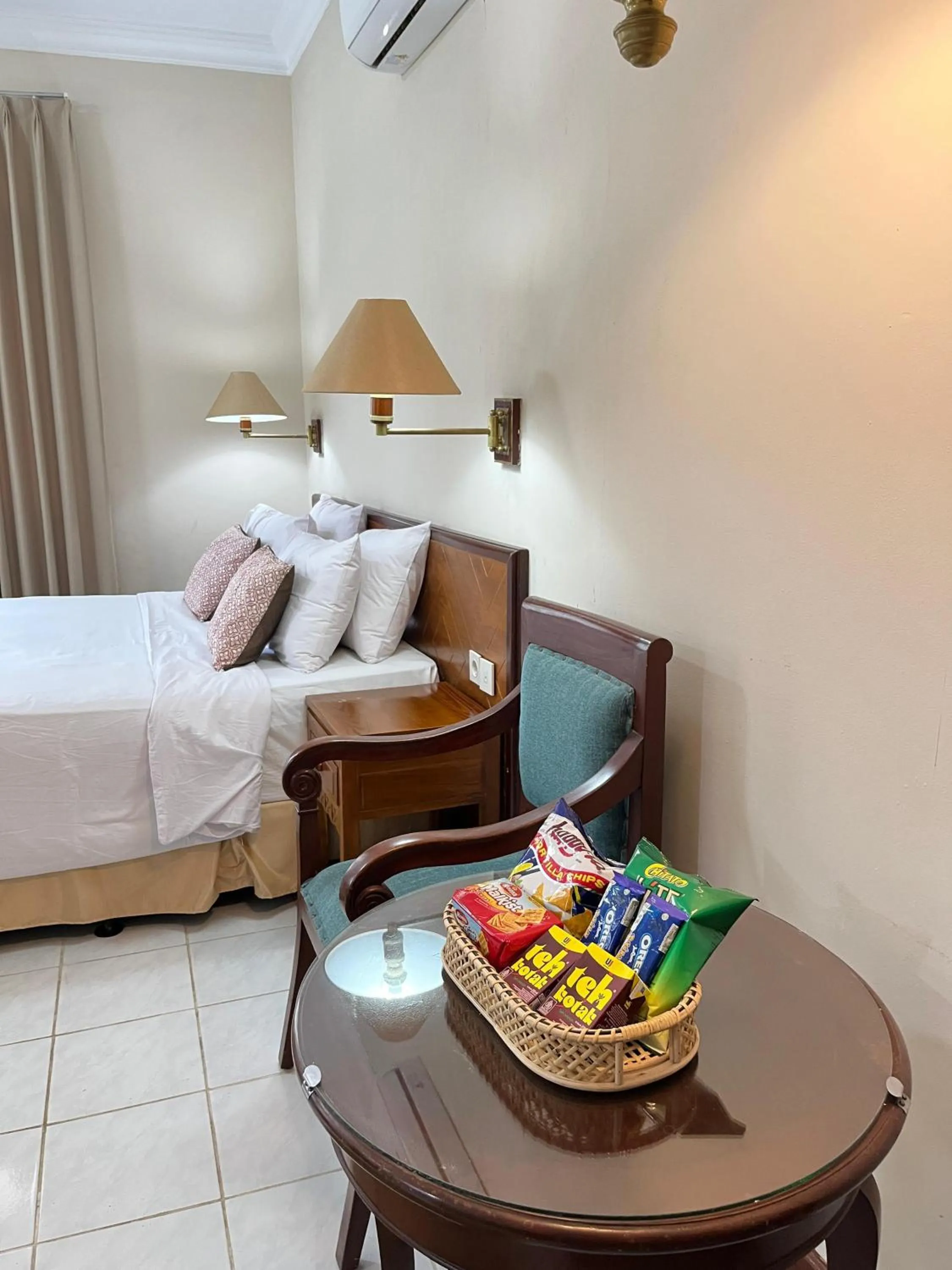 Bed in Royal Brongto Hotel