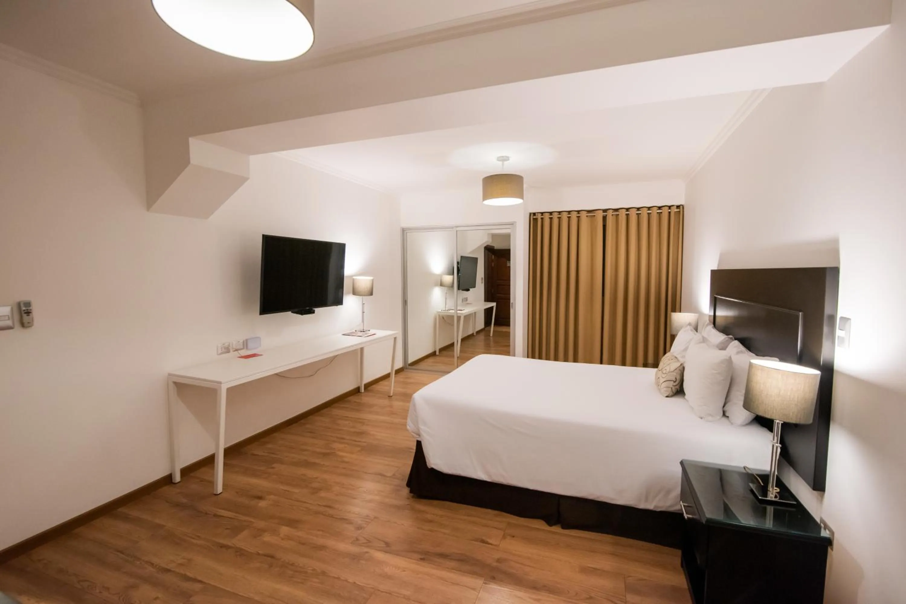 Photo of the whole room, Bed in El Polo Hotel & Suites