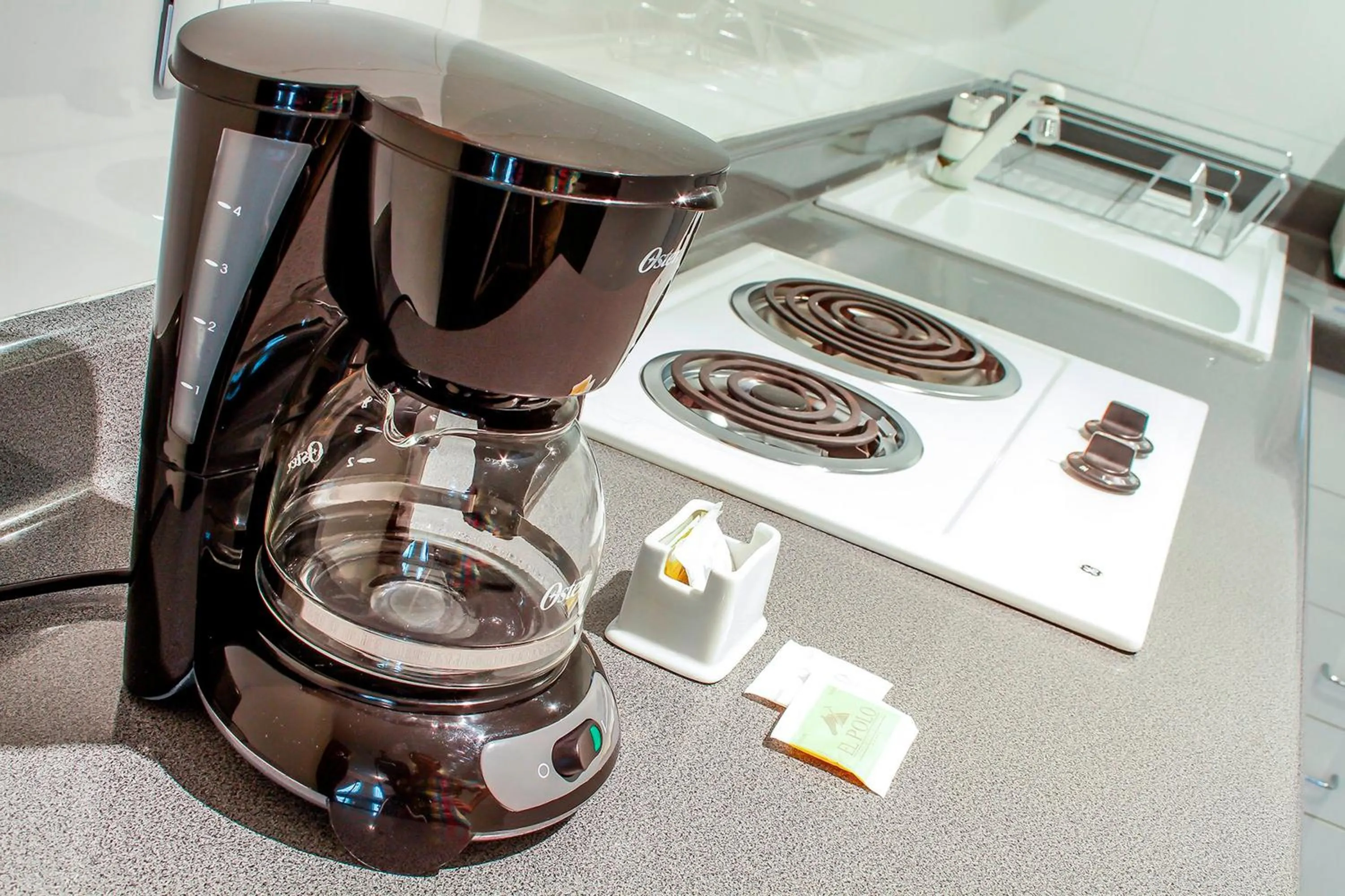 Kitchen or kitchenette in El Polo Hotel & Suites