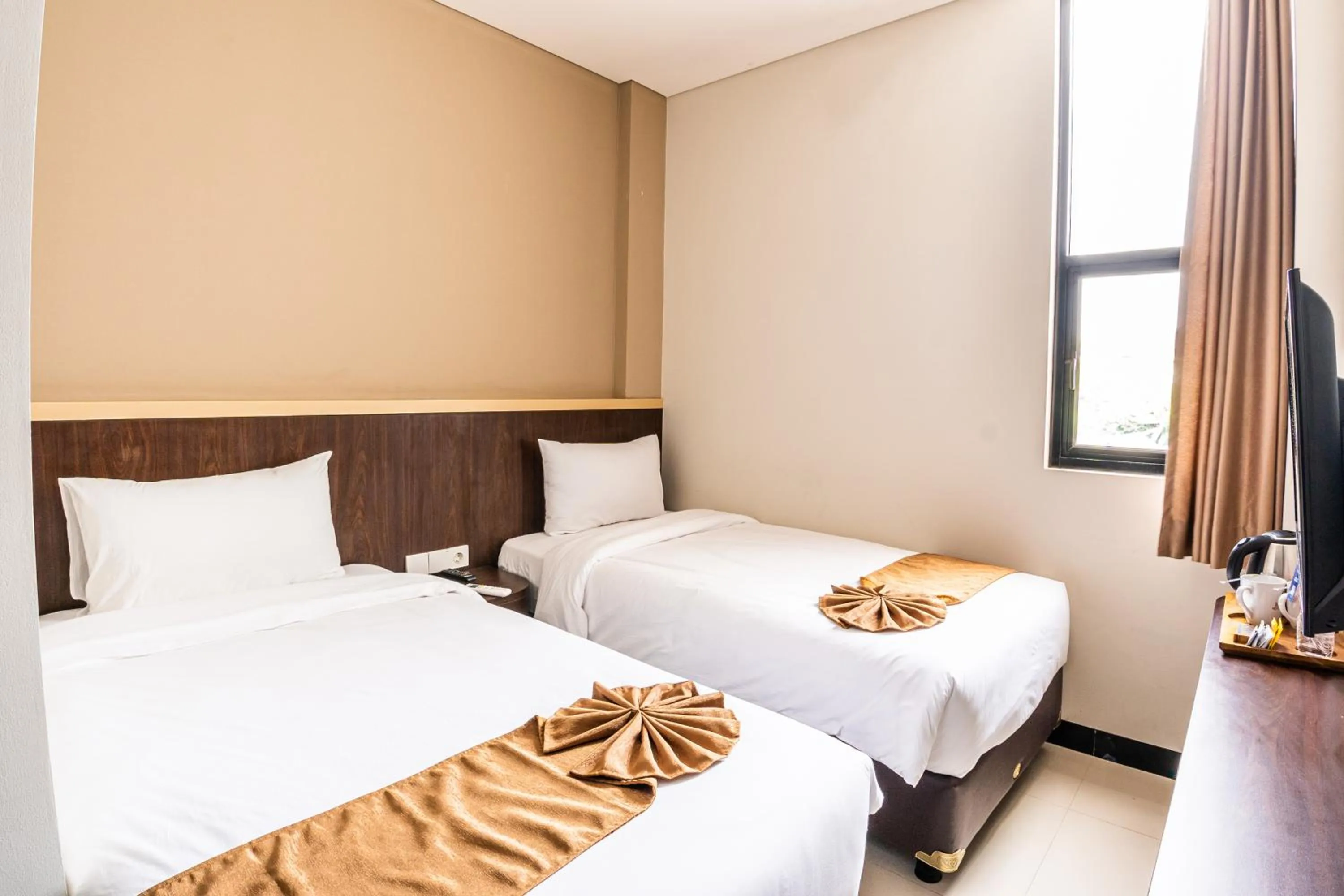 Bed in KIYANA HOTEL SEMARANG