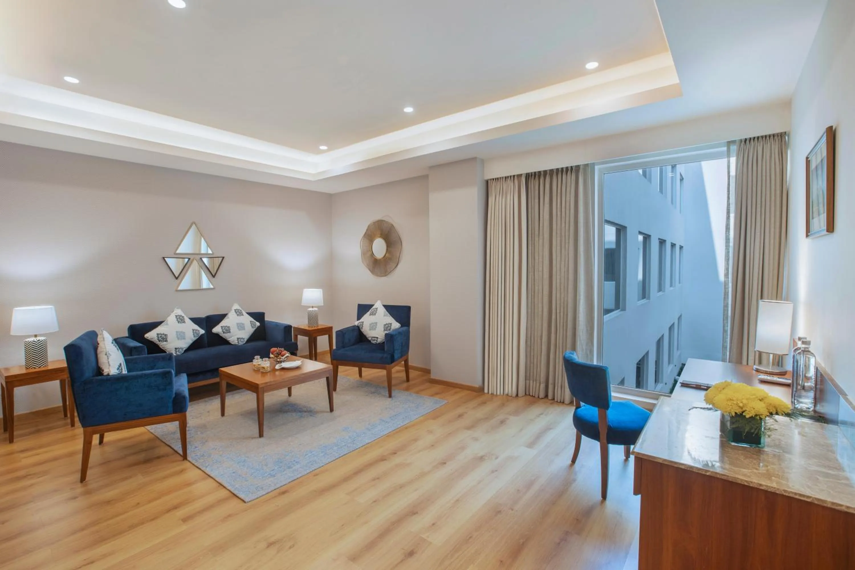 Seating area in ExpoInn Suites and Convention