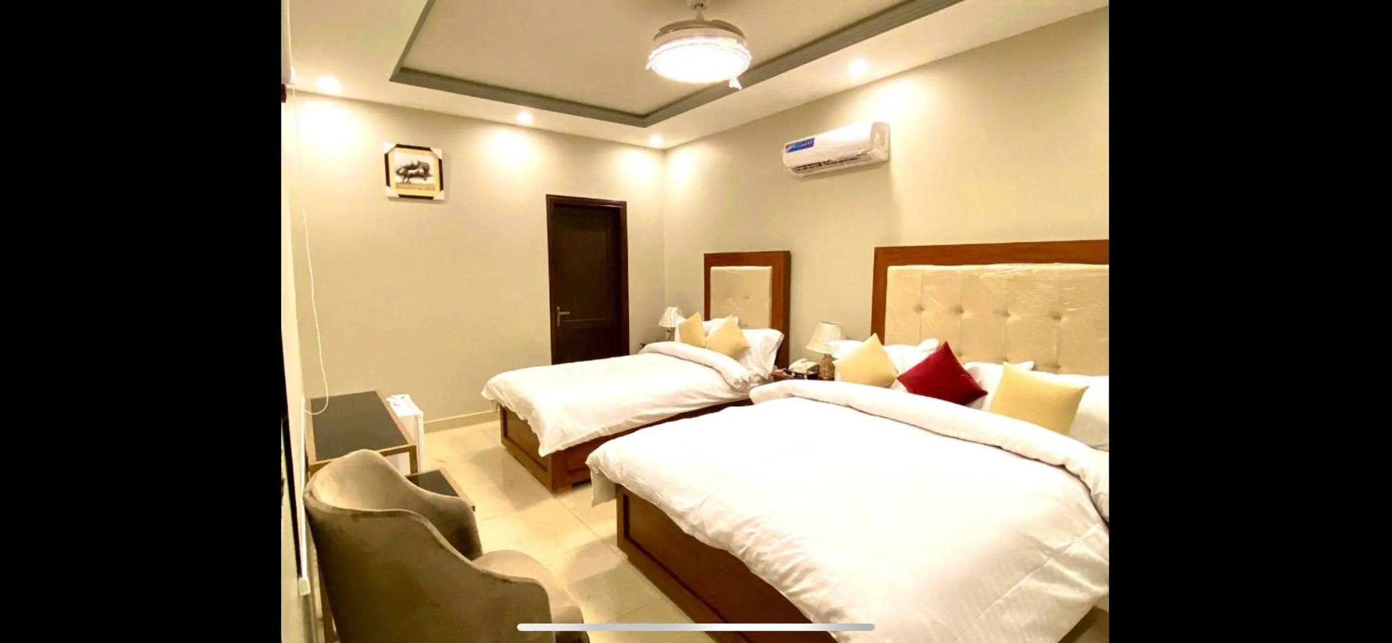 Bed in Grand Luxury Hotel Multan