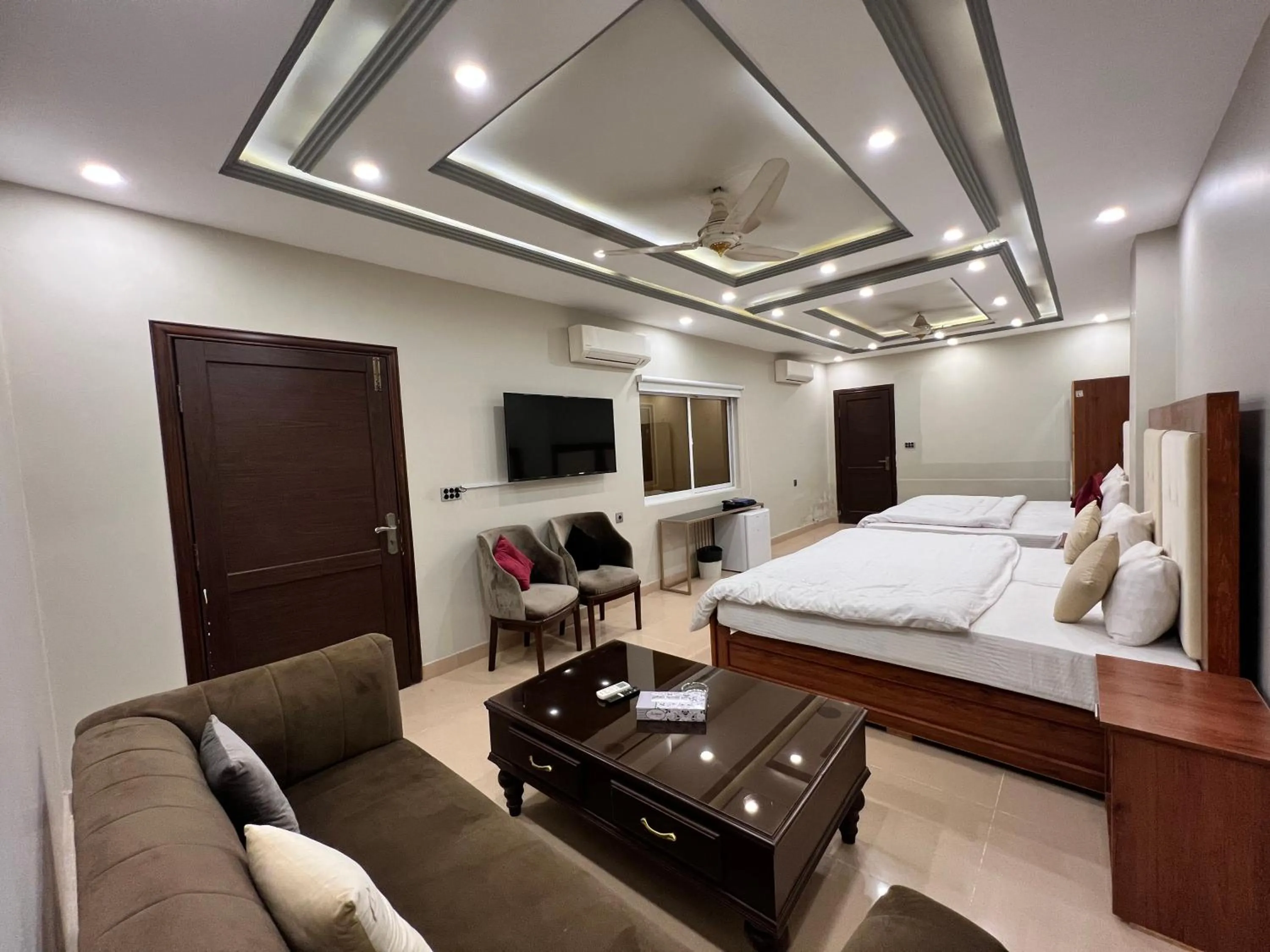 Bed in Grand Luxury Hotel Multan