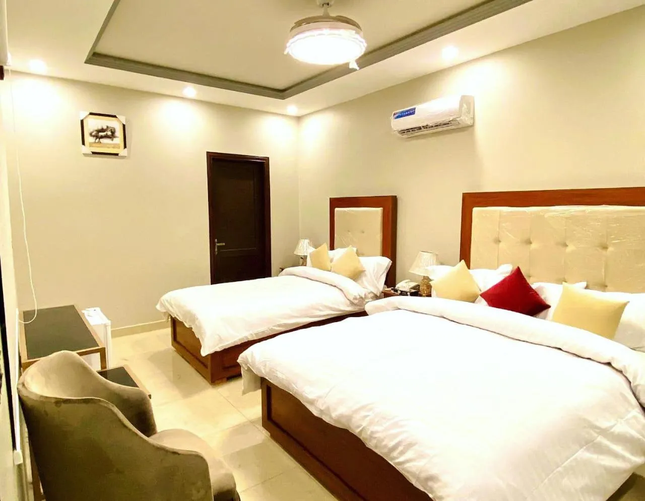 Bed in Grand Luxury Hotel Multan