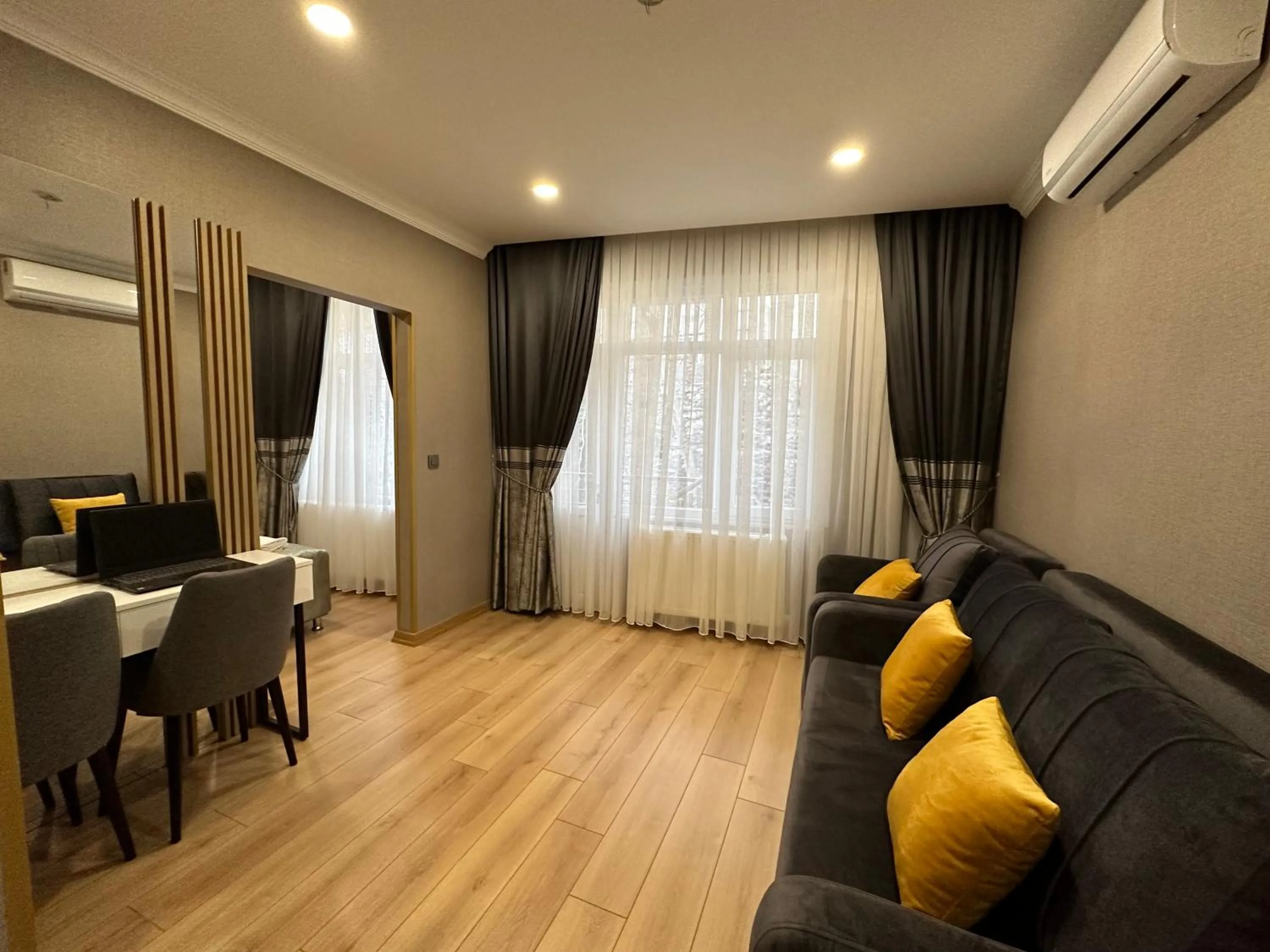 Living room in H&L Suites