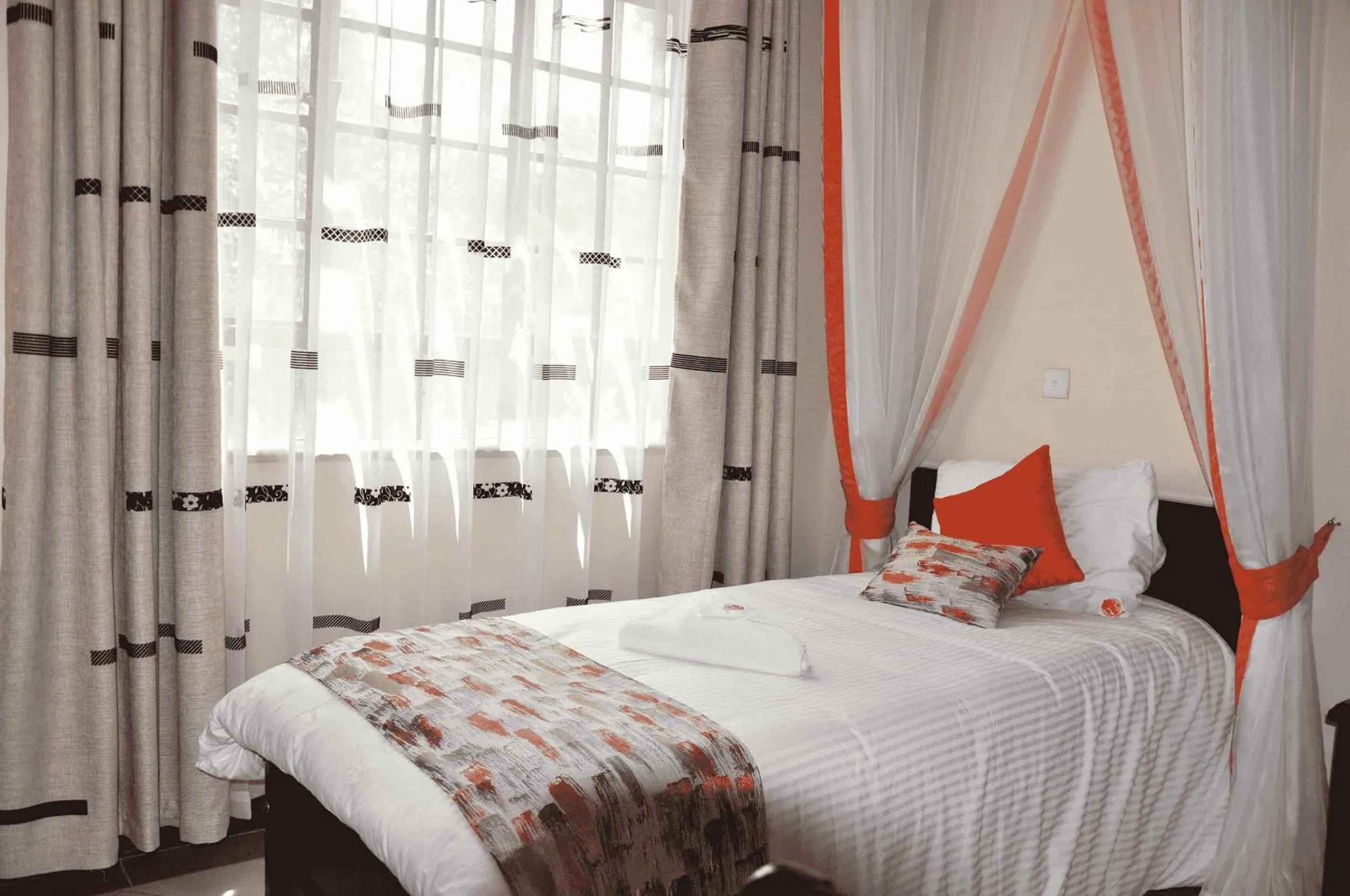 Bed in The Radix Hotel Limited