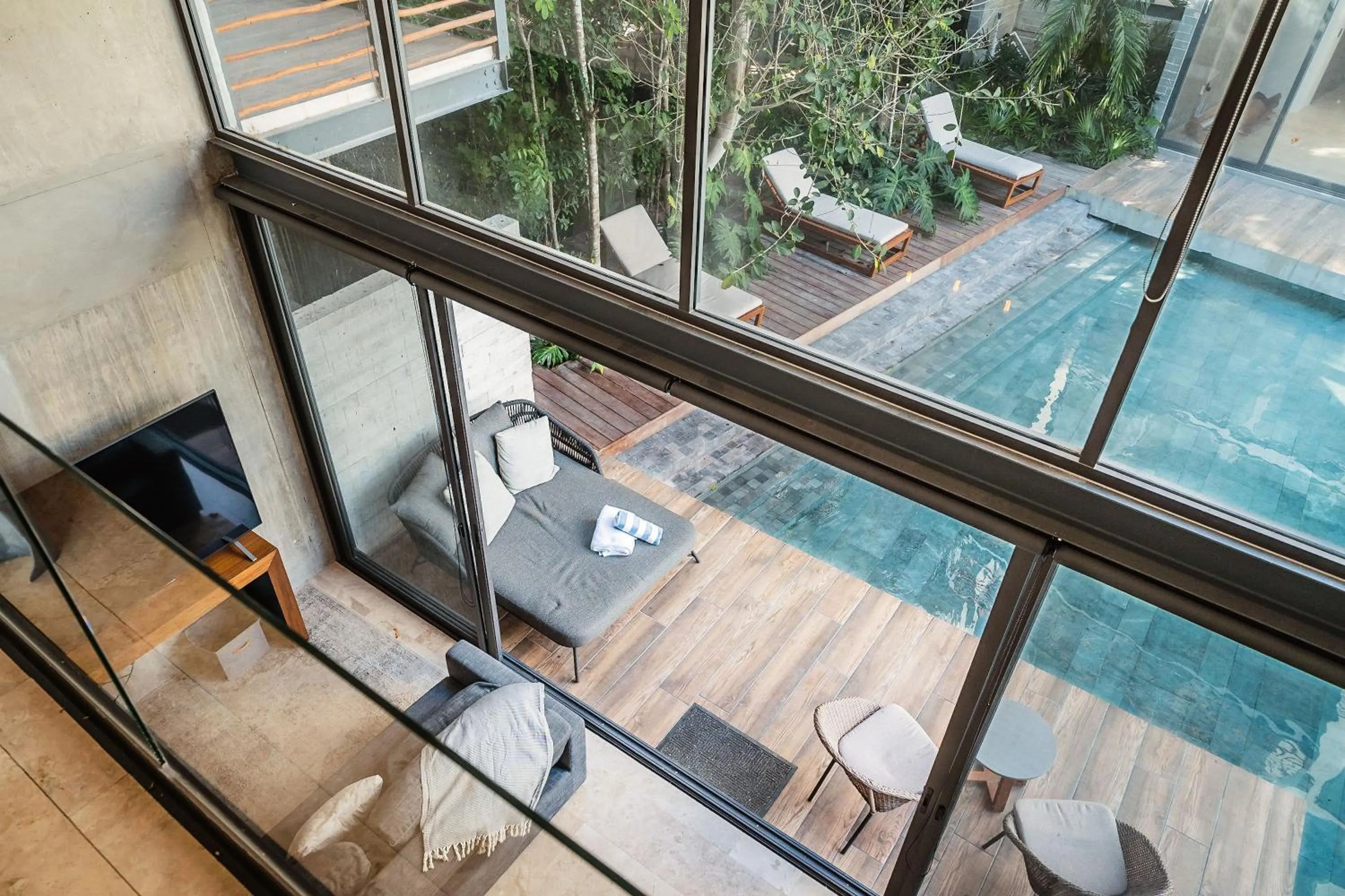 Patio in Incredible 1BR Swim Up with Private Cenote and Big Gym