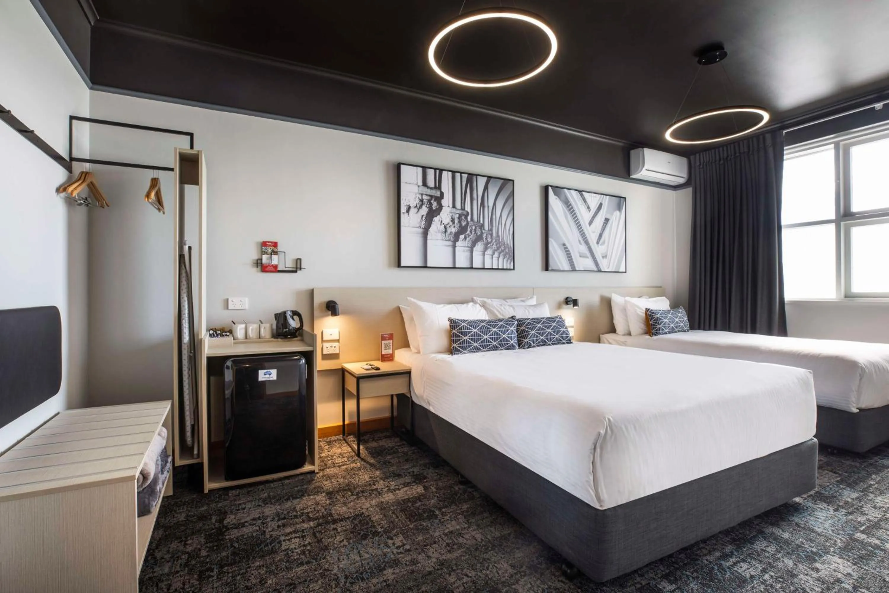 Bedroom, Bed in Nightcap at Empire Hotel