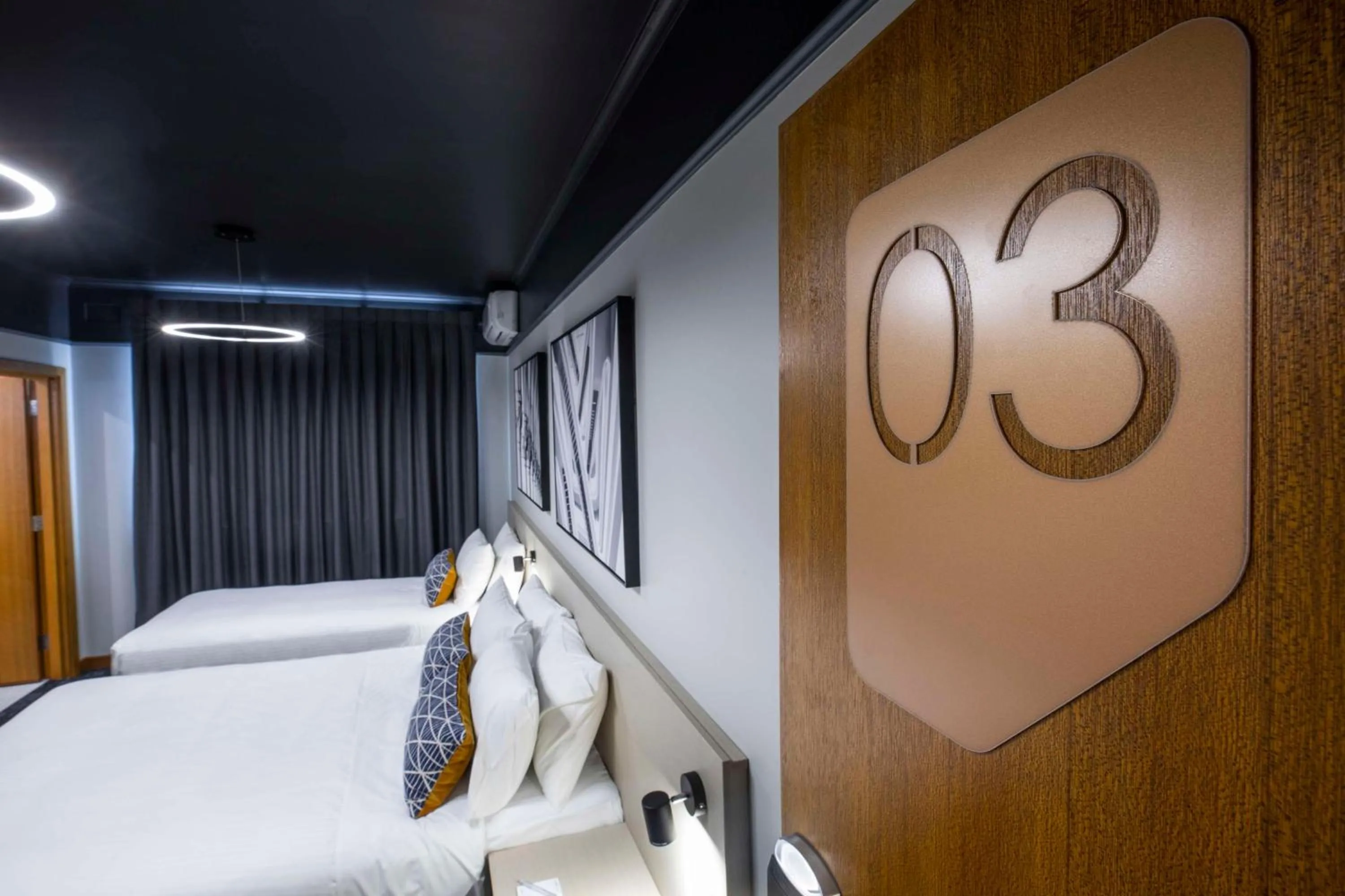 Bedroom, Bed in Nightcap at Empire Hotel