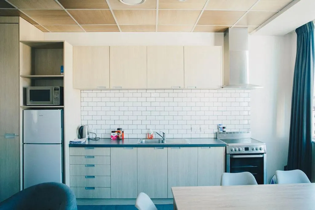 Kitchen or kitchenette in Liberty Apartment Hotel