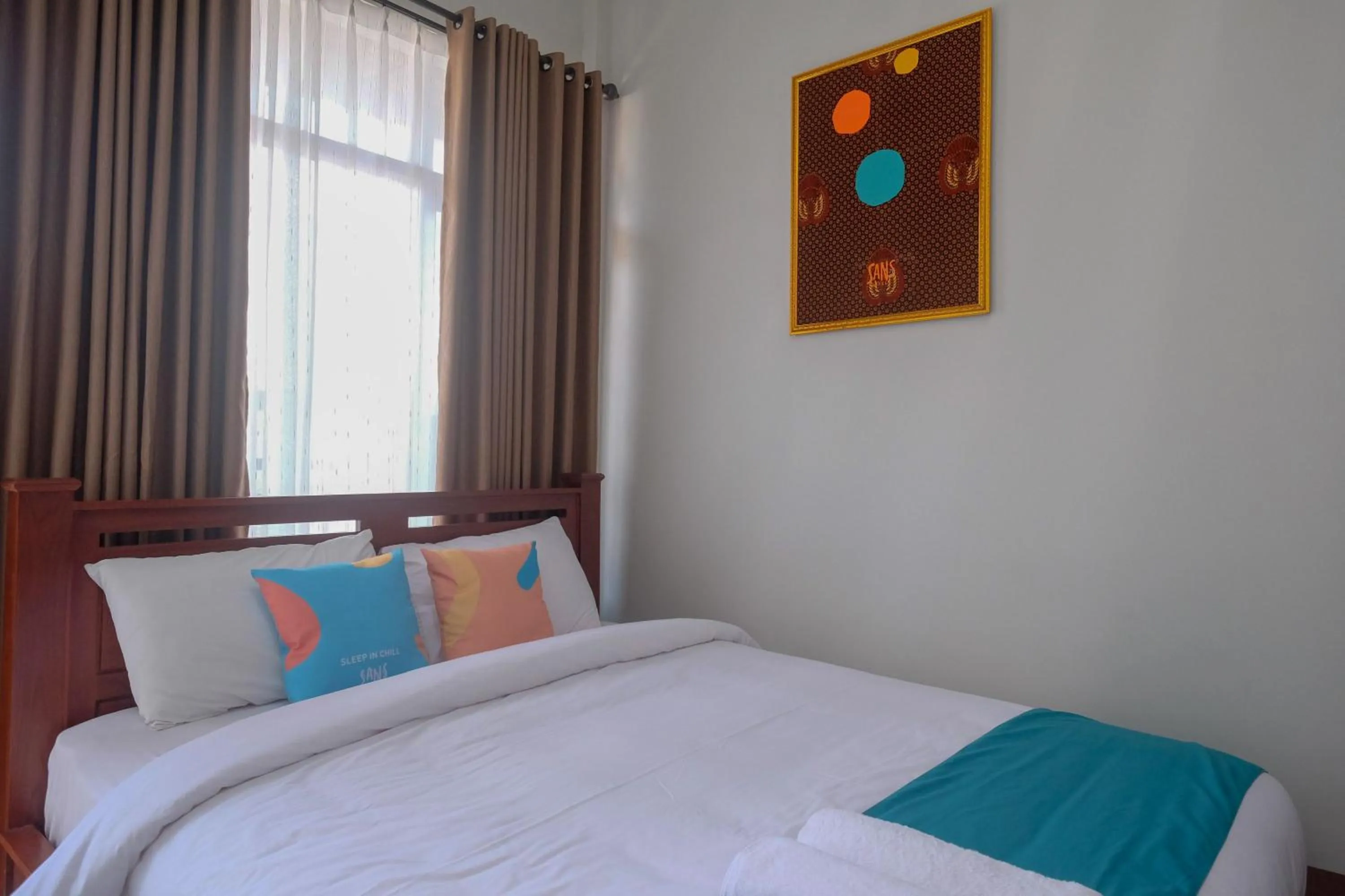 Bedroom, Bed in Sans Hotel Kumbang Yogyakarta by RedDoorz