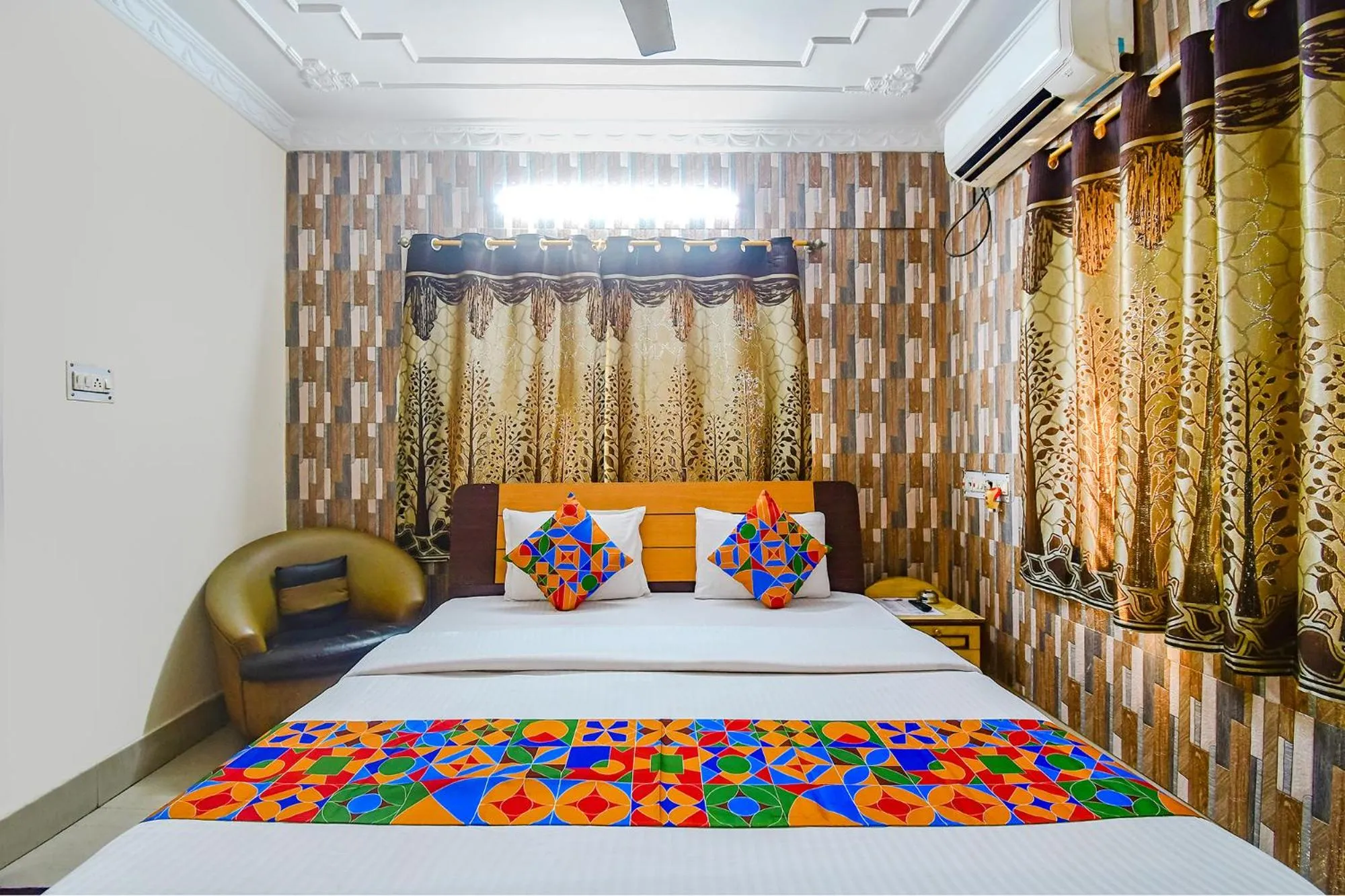 Bed in FabHotel Heritage Inn