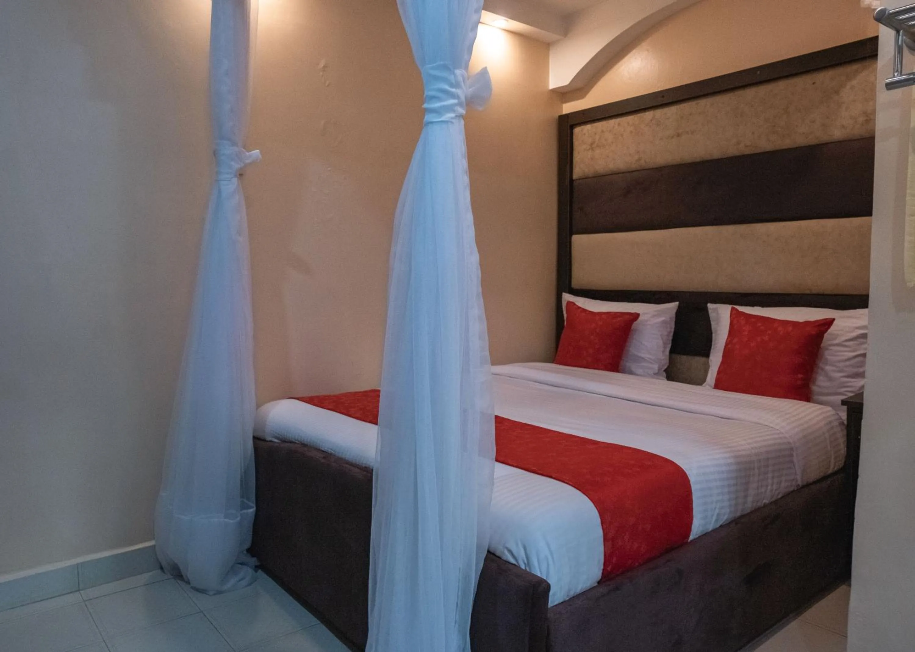 Bed in Gardens Executive Suites