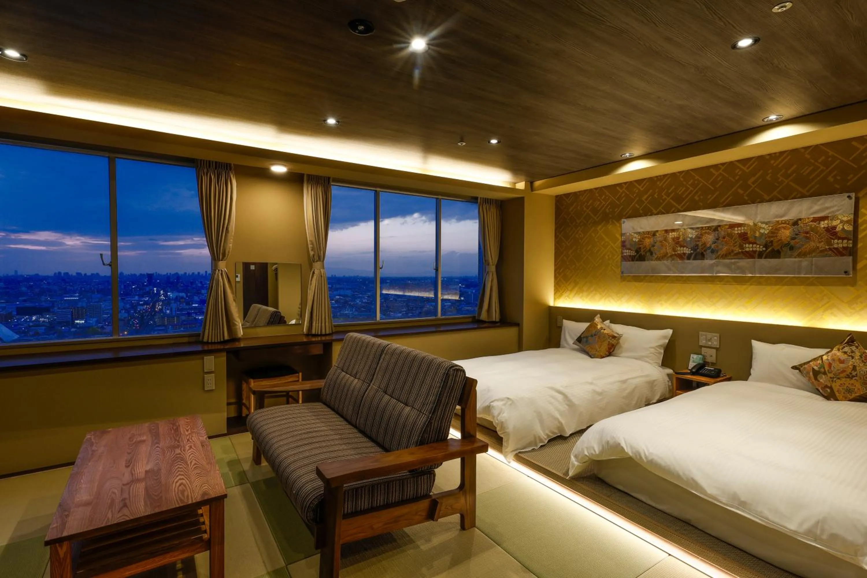 Living room, Bed in Hotel Seiryu Japanese Spa inn with spectacular view in Osaka