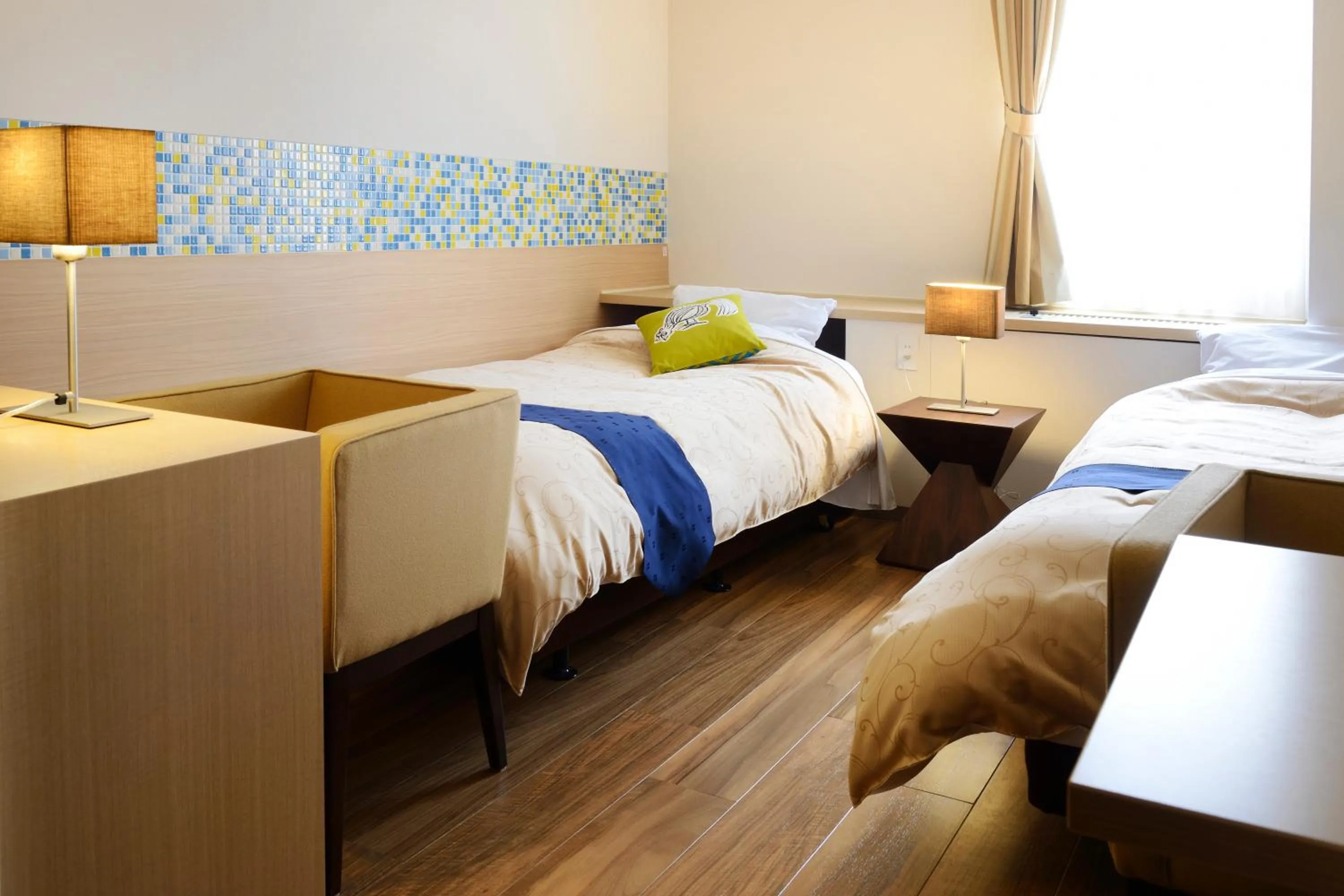 Bed in Hotel Seiryu Japanese Spa inn with spectacular view in Osaka