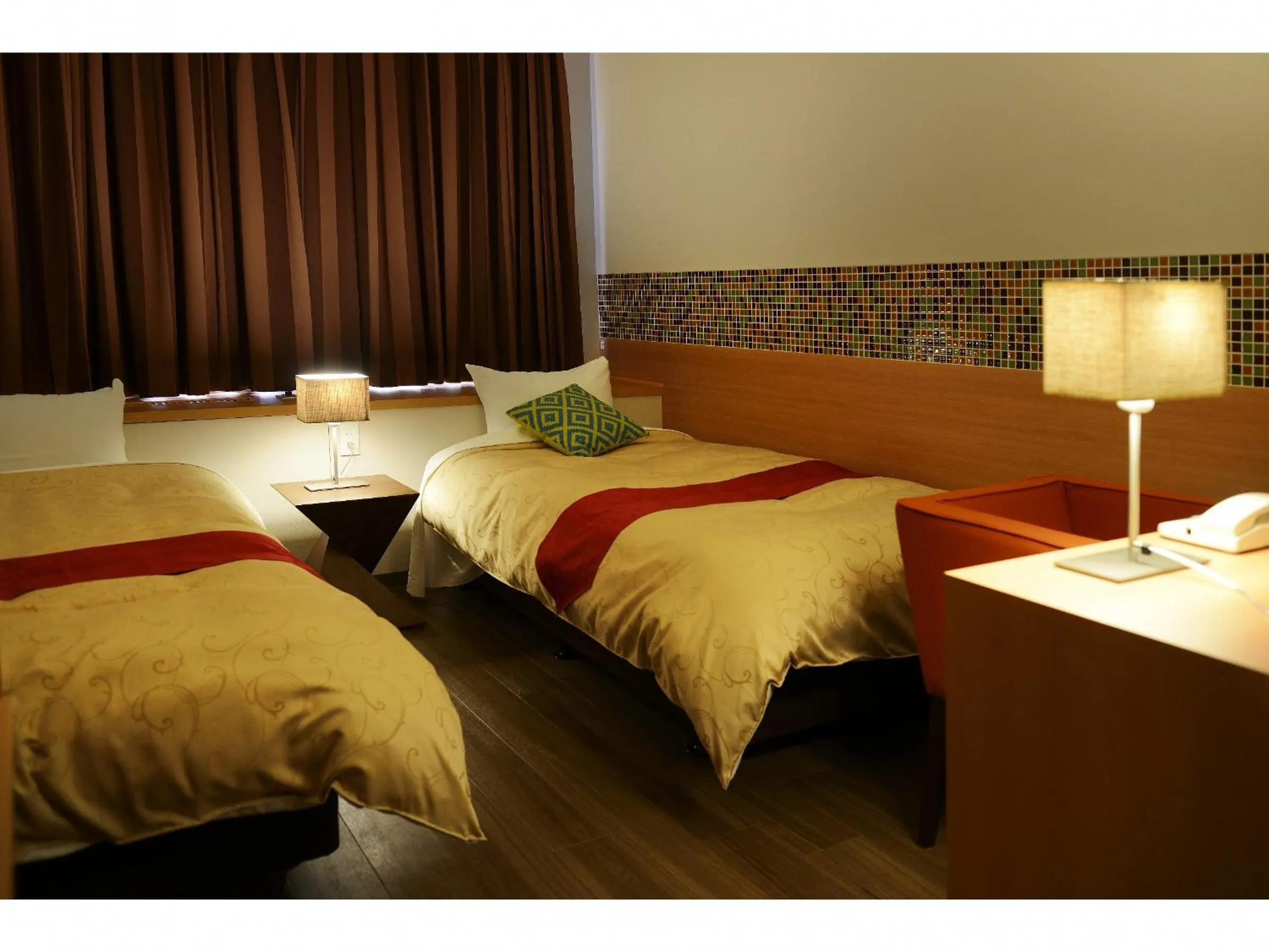 Bed in Hotel Seiryu Japanese Spa inn with spectacular view in Osaka