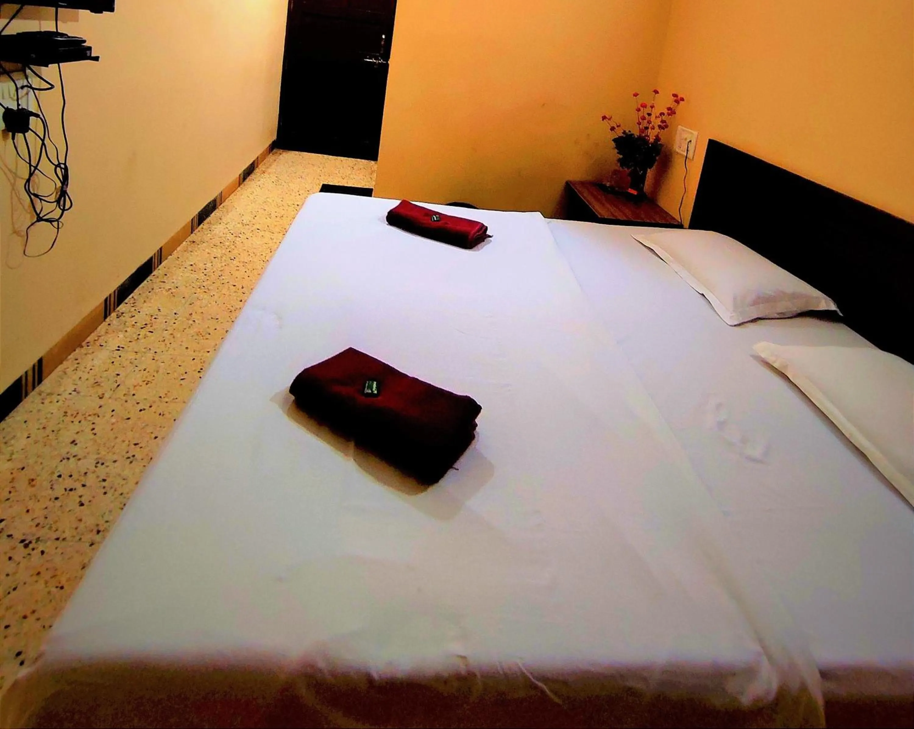 Bed in Mandarin Hotel Mapusa